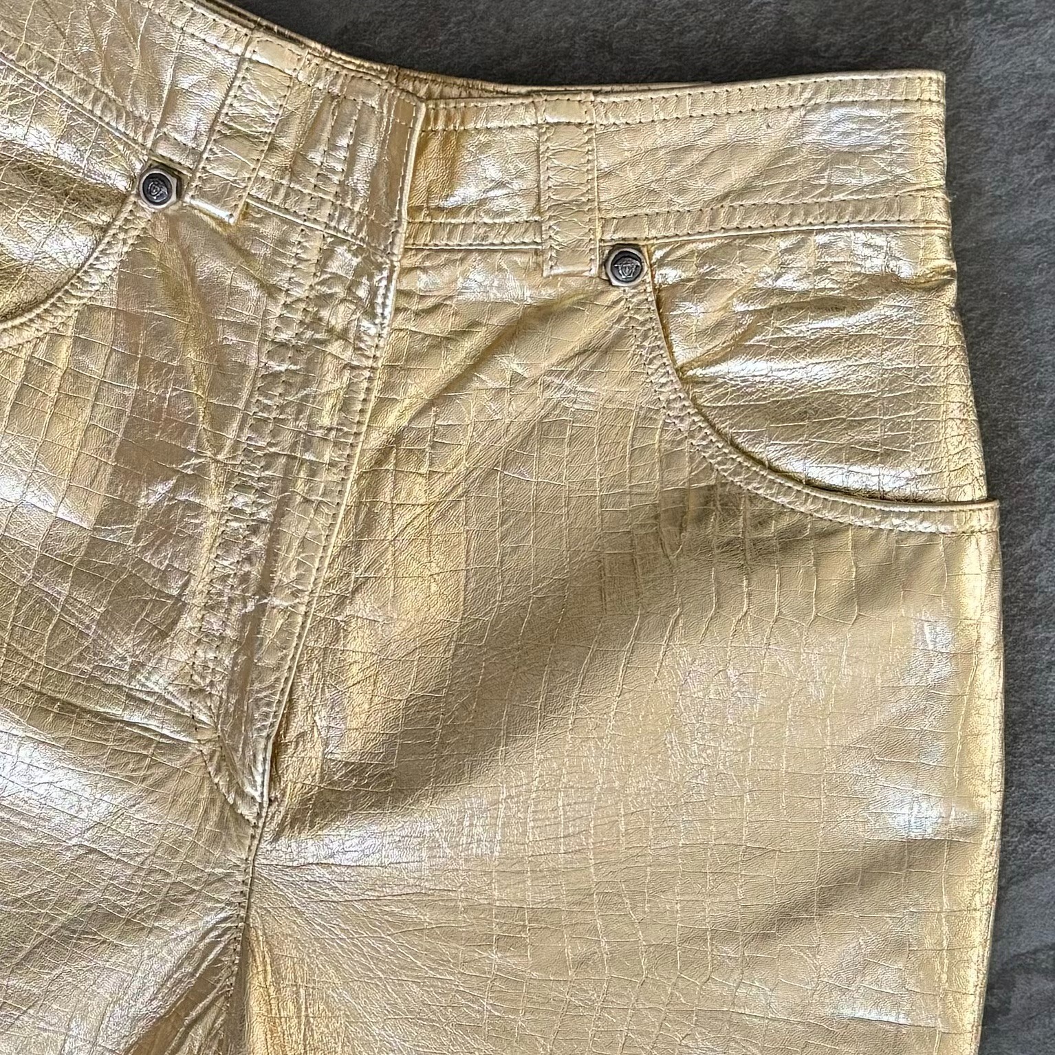 GIANNI VERSACE metallic gold leather pants size IT 40/42 from F/W 1994/95