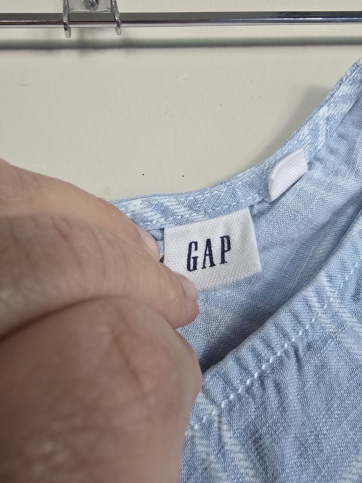 This light blue dress from Gap features a white checkered pattern and an A-line