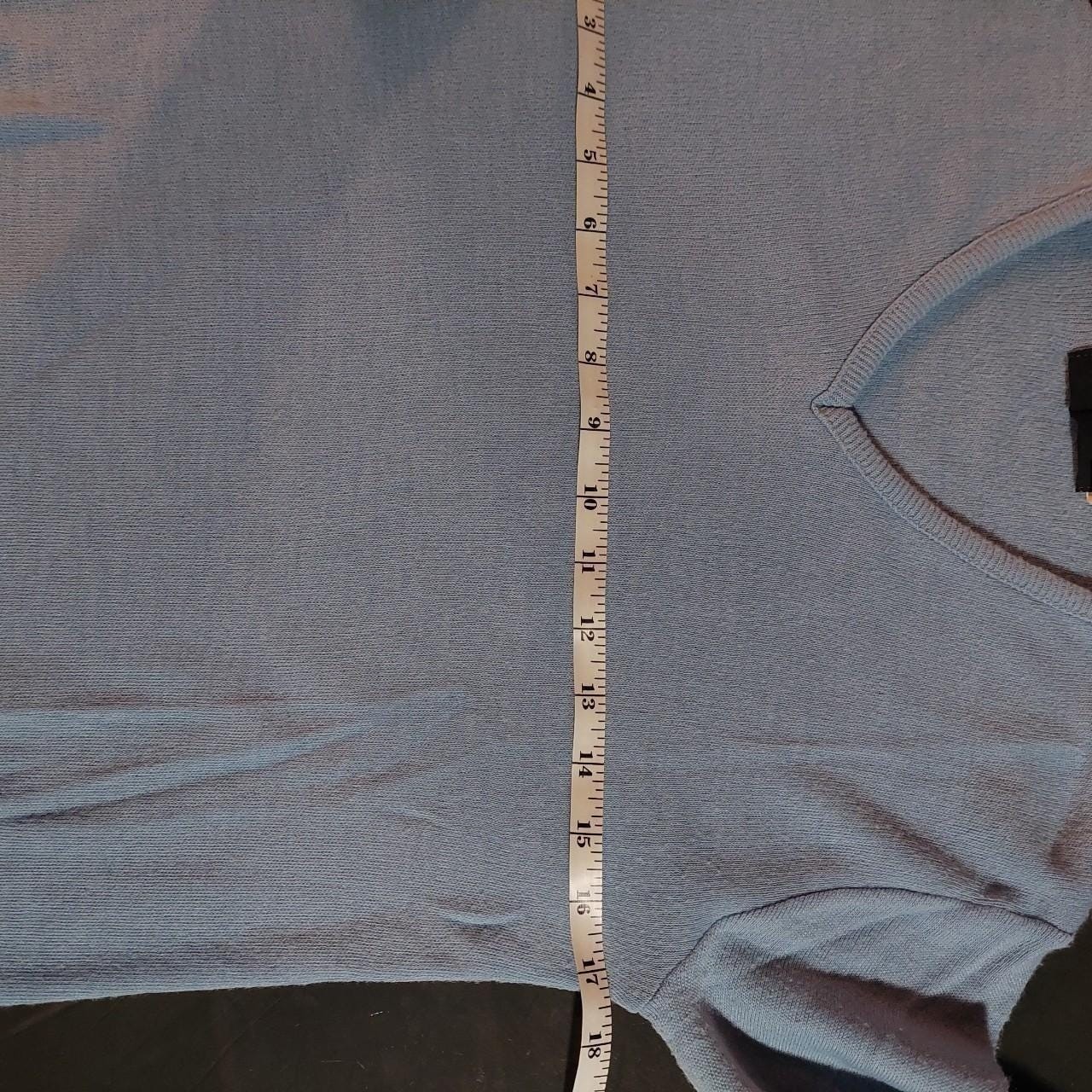 Vintage light blue V-neck sweater.