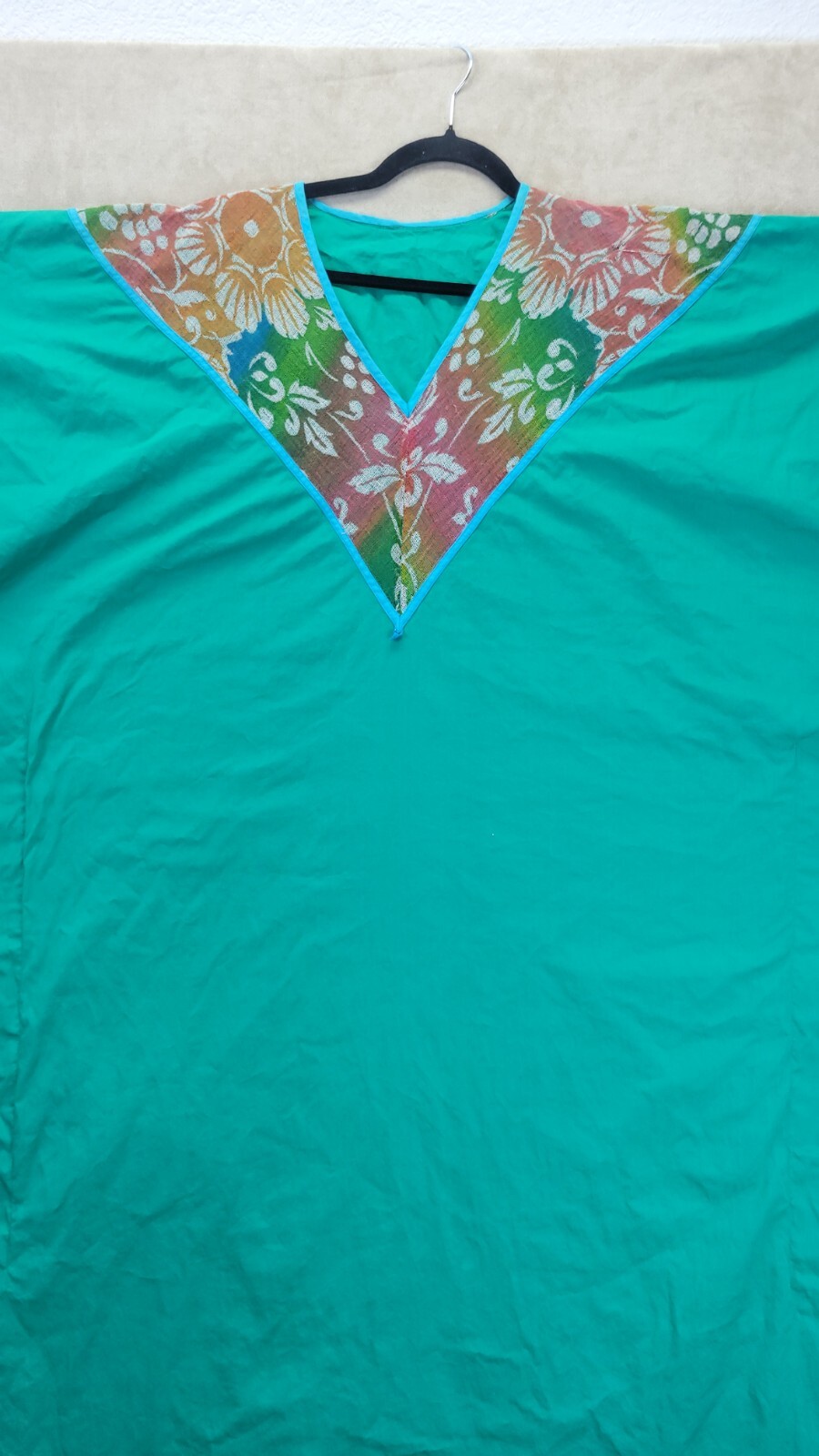 Vintage Womens Teal Muumuu With A Multi Colored Cheese Cloth Vneck Design
