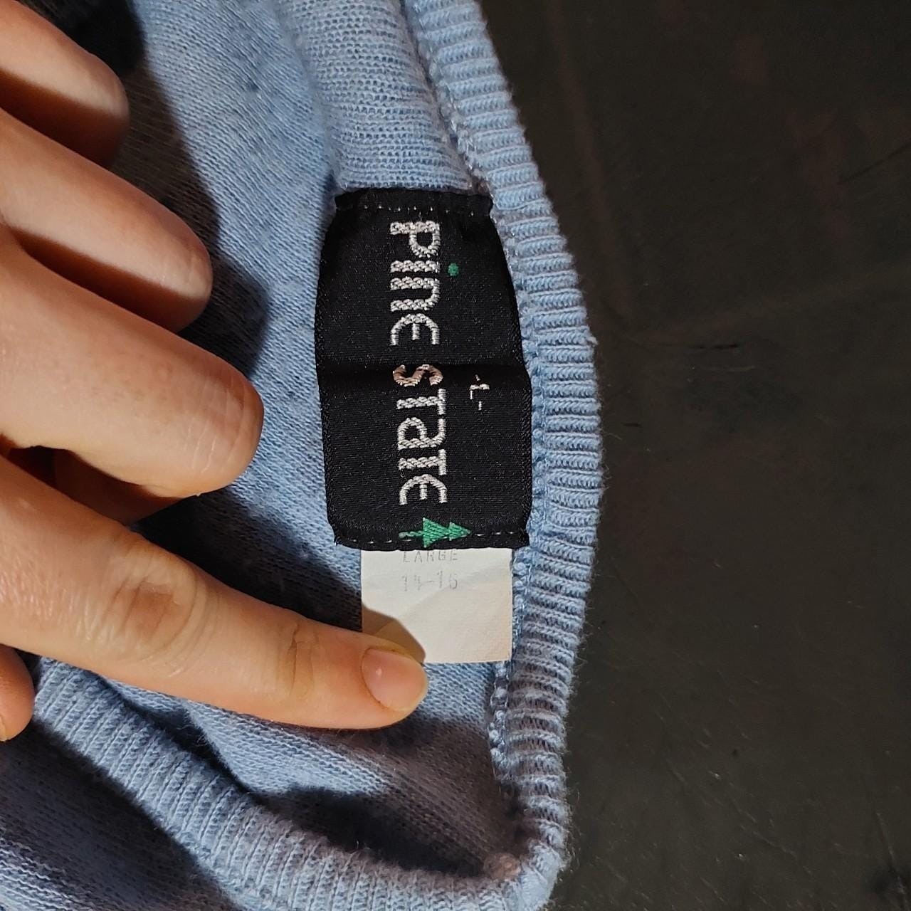 Vintage light blue V-neck sweater.