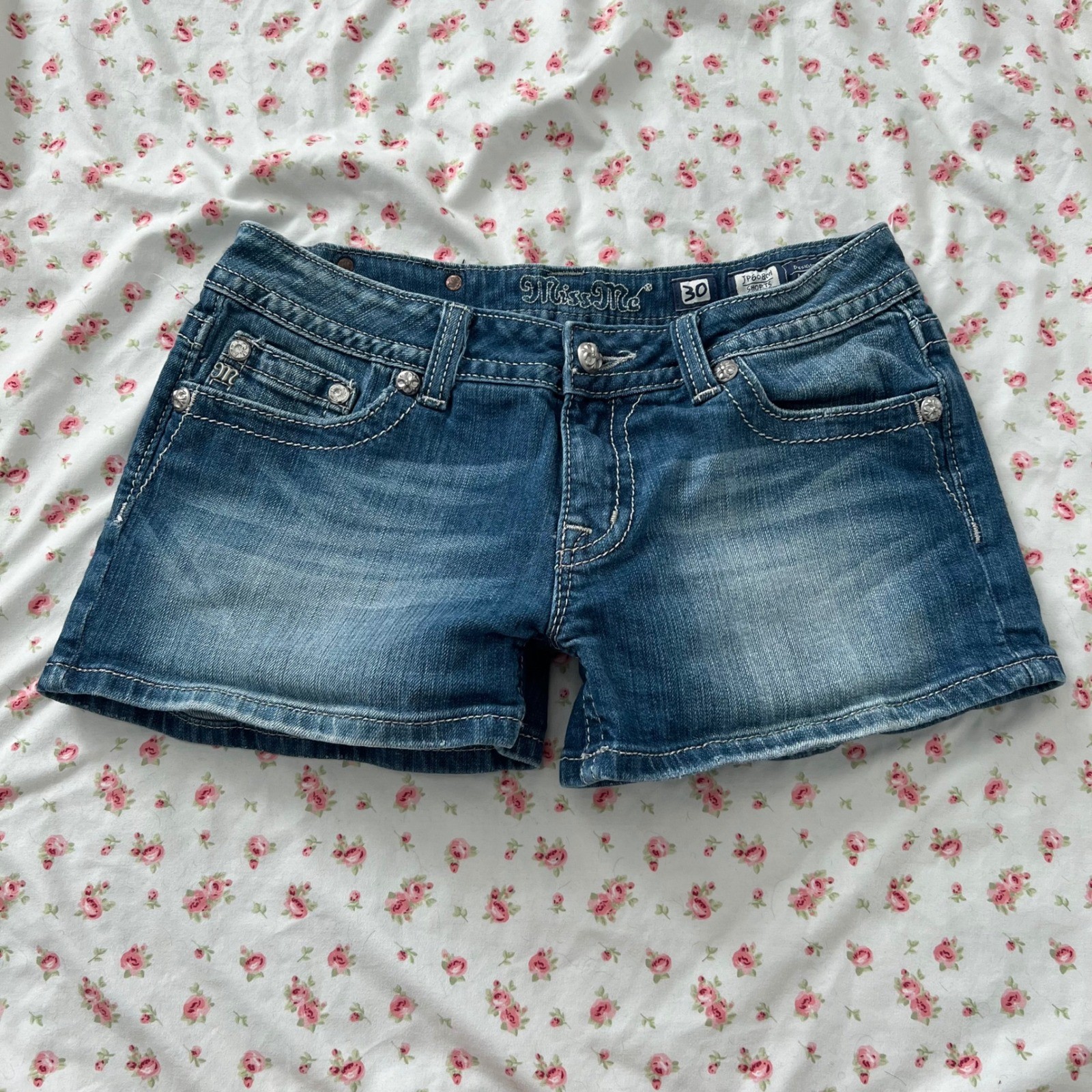 vintage y2k miss me low rise denim shorts with rose embellished back pockets