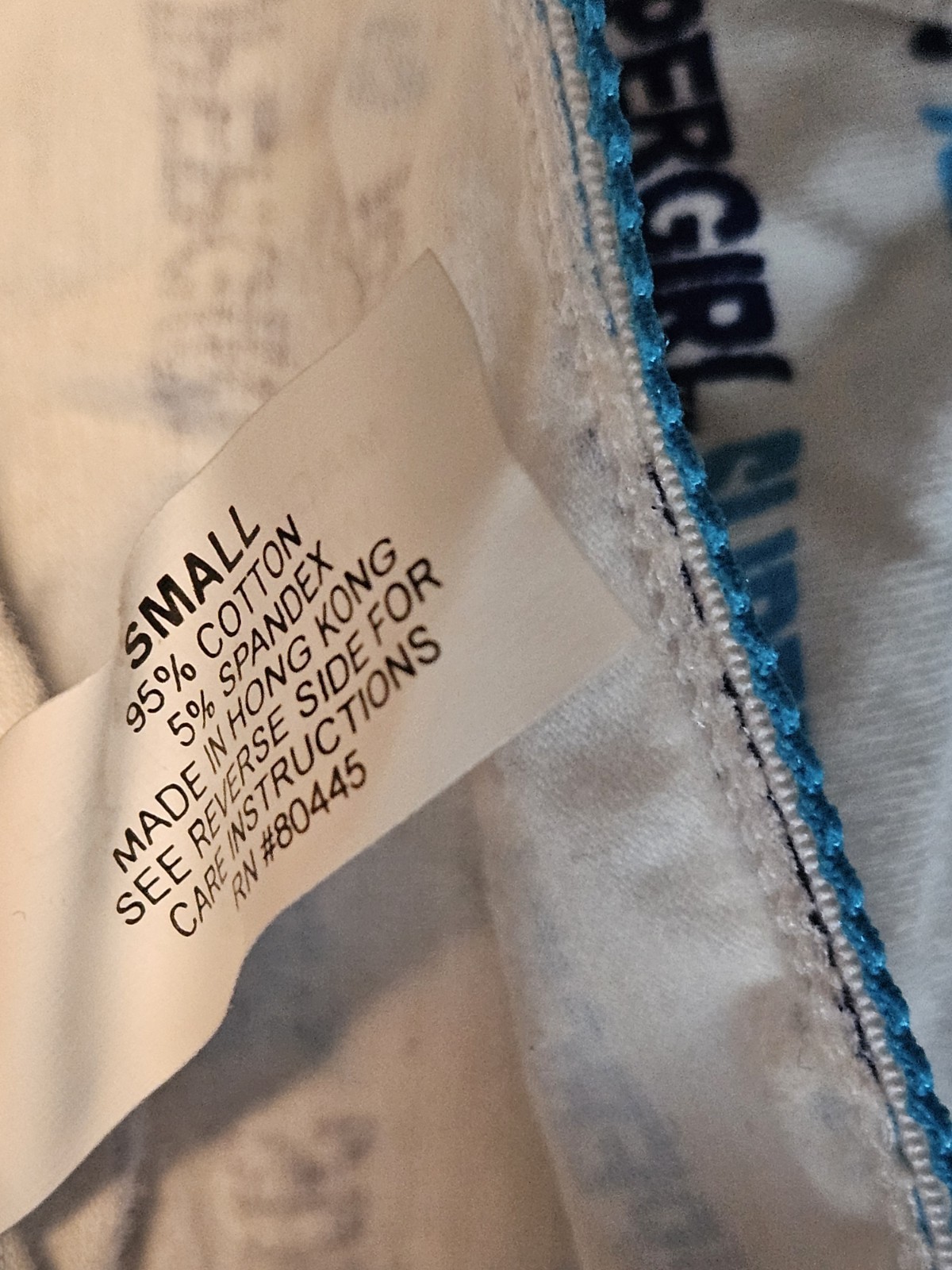 SuperGirl Intimates Women’s Bikini Panties Sz: SMALL Color: WHITE/BLUE WRITING