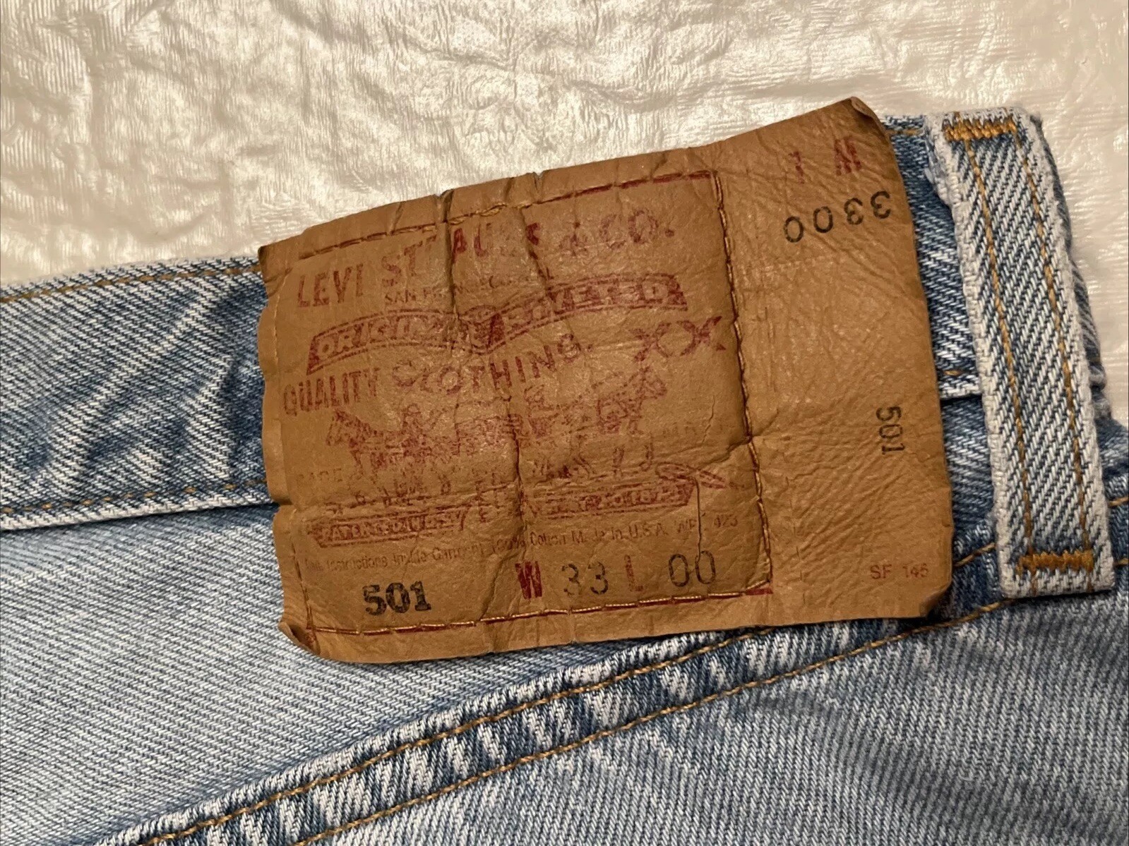 vtg 90s Levi’s 501 MADE IN USA blue jeans button fly womens 33 light wash 32×24