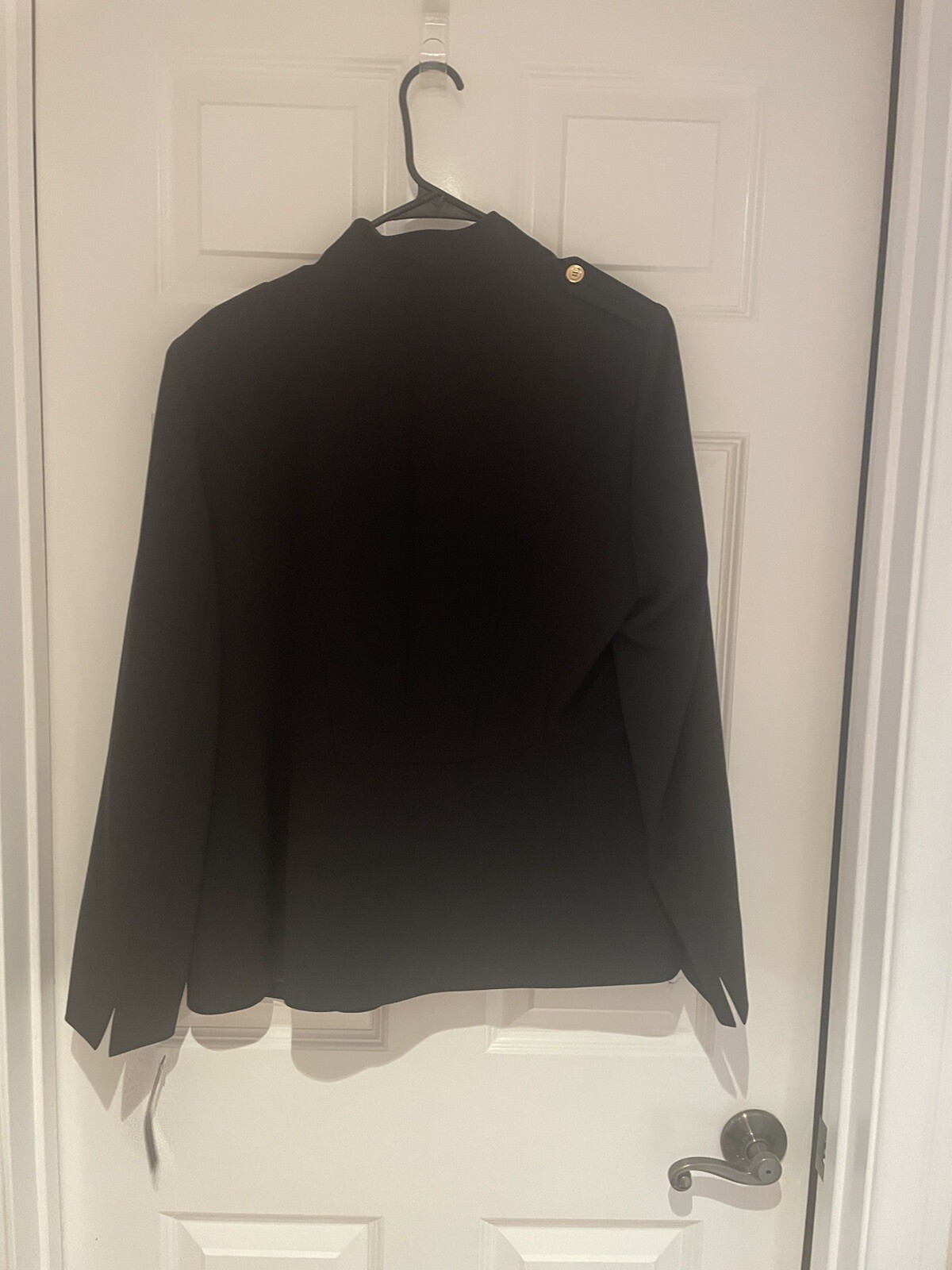 Tahari Arthur S. Levine 2 piece garment, blazer and pants. Size 10. Color black.