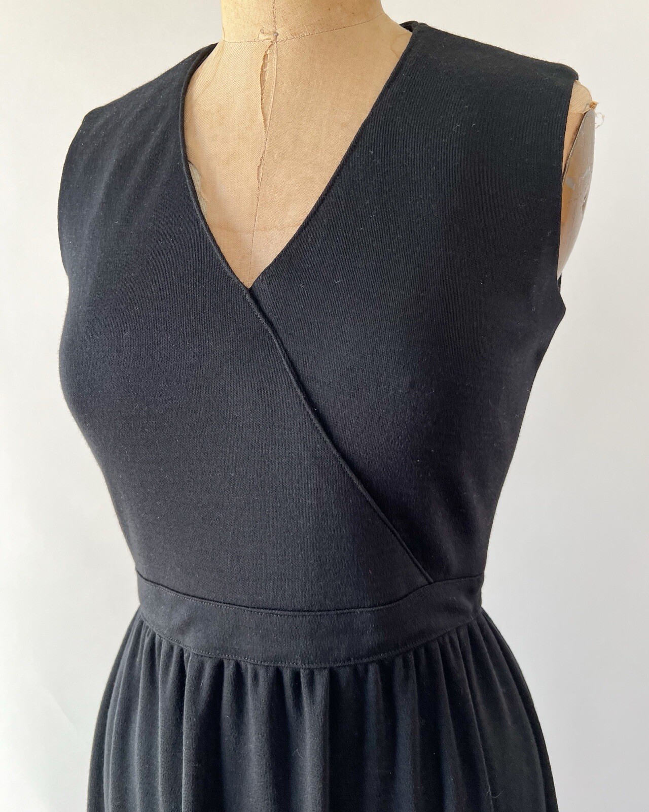 Vintage 1970s Black Knit Wool Midi Dress Sleeveless Fit & Flare Surplice Neck XS