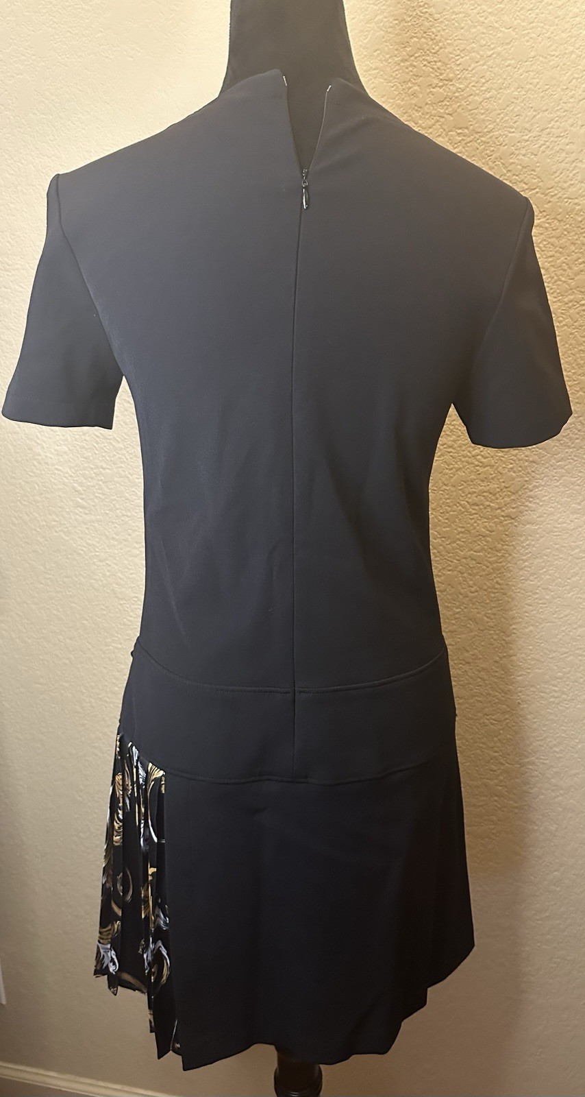 Black Asymmetrical Skirt with Floral Pleated Panel and Buckle Accent