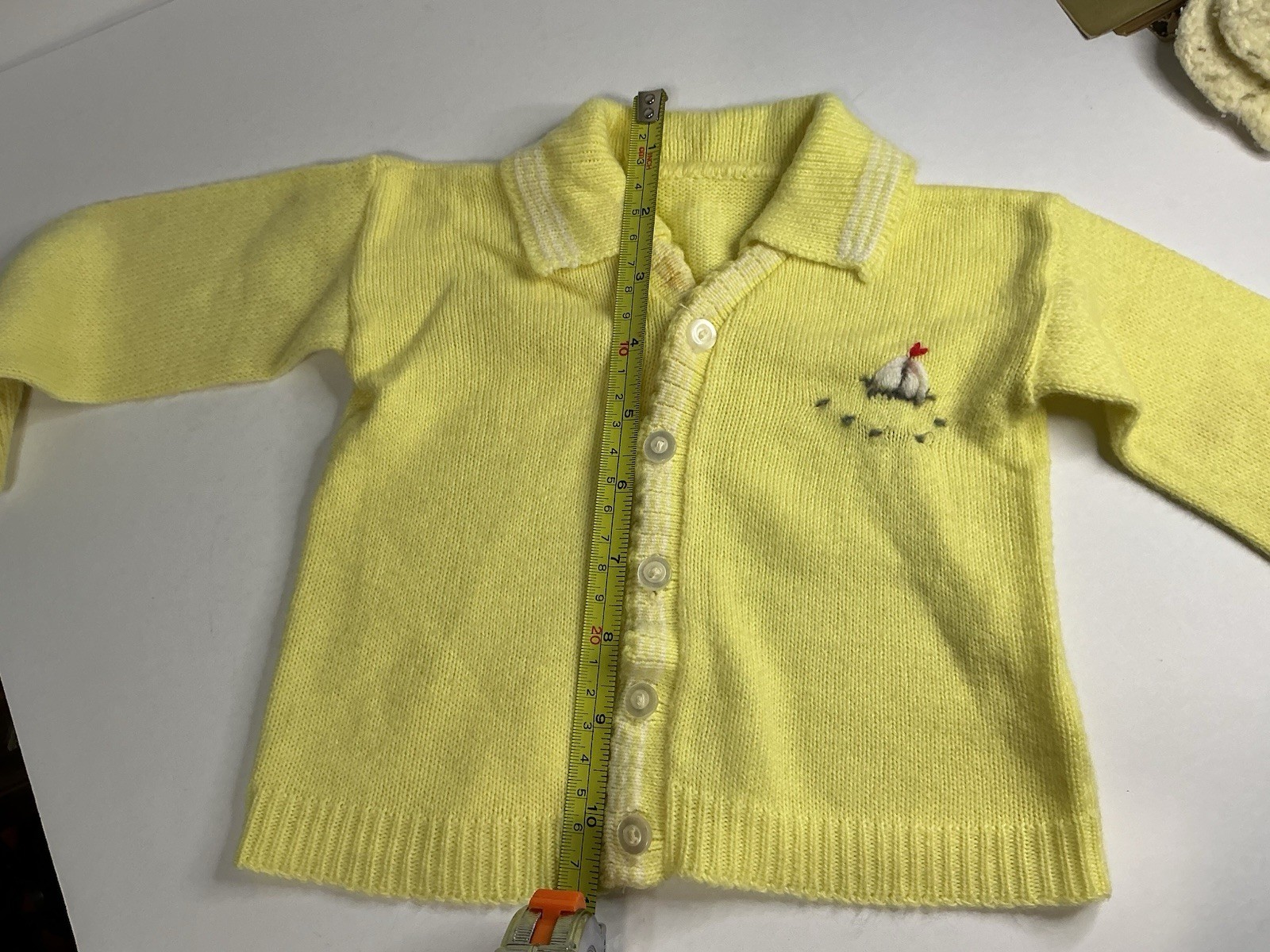 Vintage 1950s Santone romper, sailboat knit, and classic cardigans