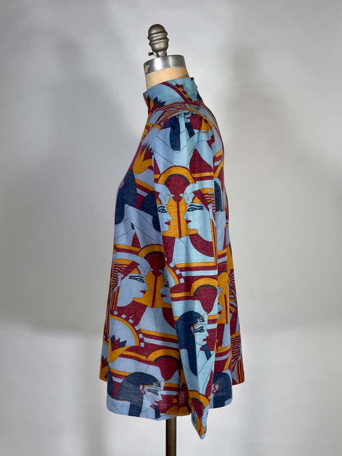 Vintage 1960’s-70’s blue EGYPTIAN print medium-weight knit top by Add 1 Ltd. S/M