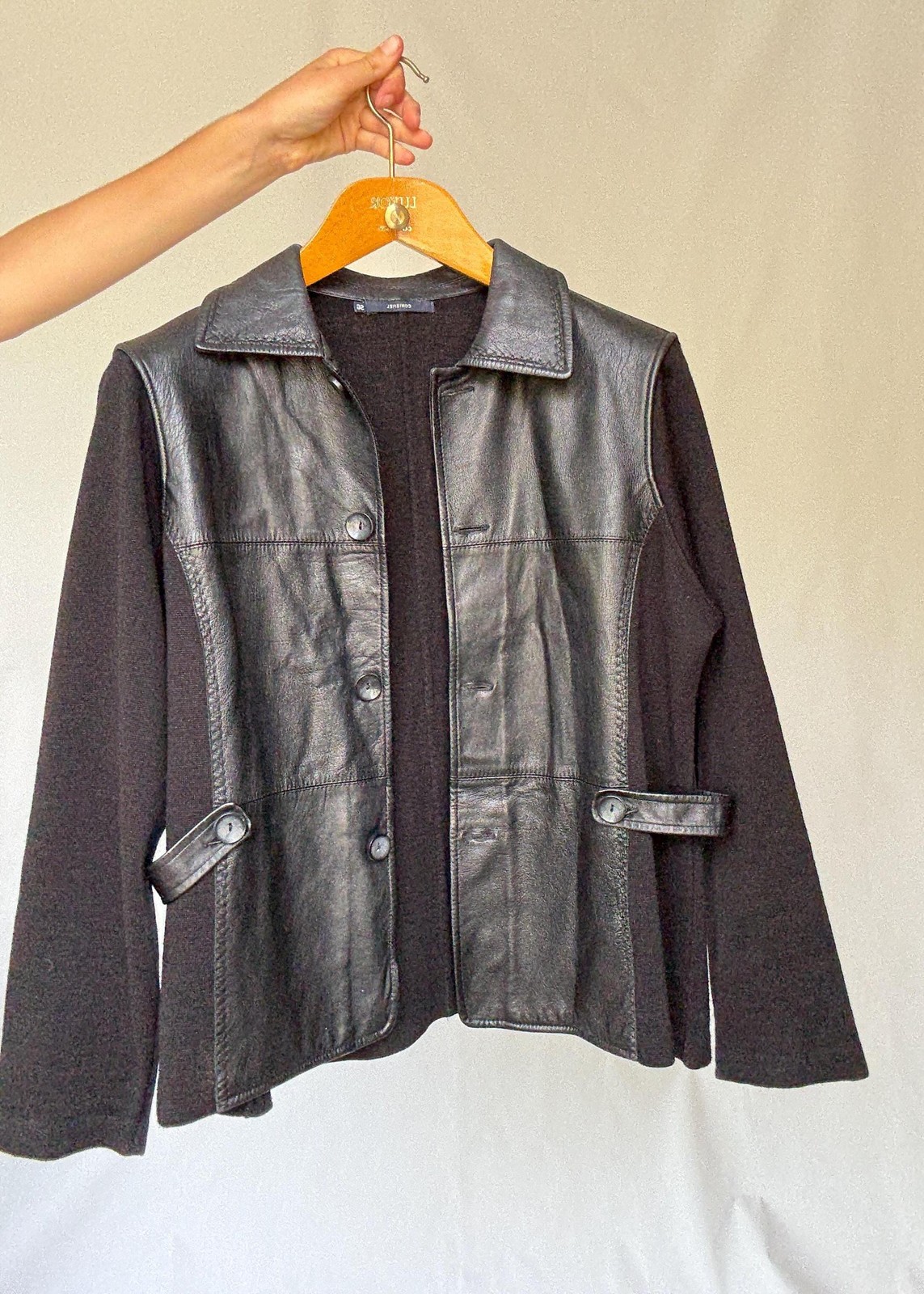 Luxury black leather and wool blend jacket, vintage minimalist style