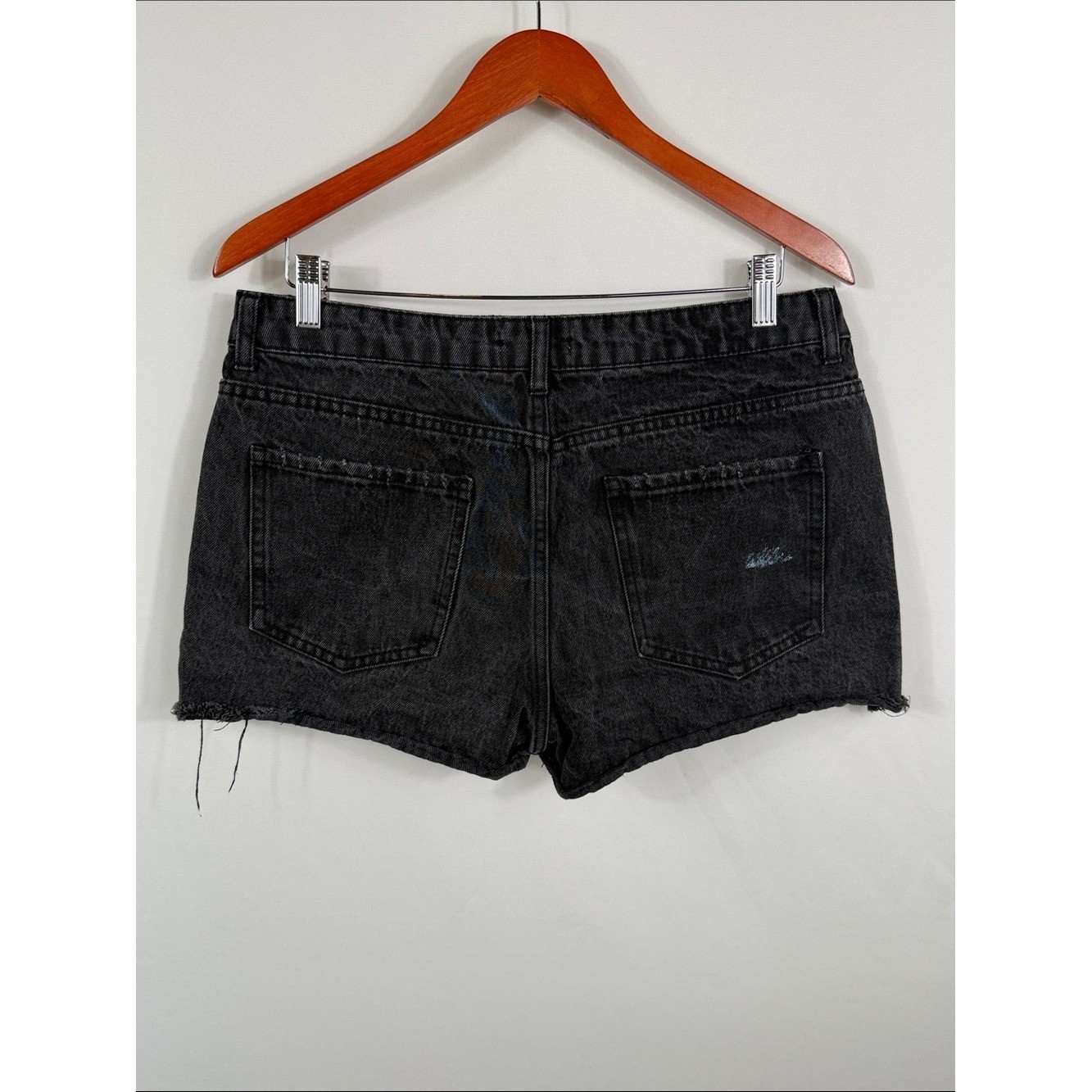 Forever 21 Black Distressed High-Rise Denim Shorts. Paint mark on back. Size 29