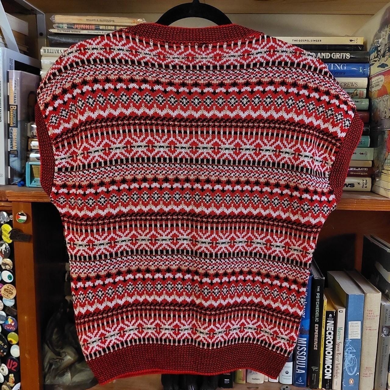 Vintage red, black, white, and tan geometric patterned sweater vest.
