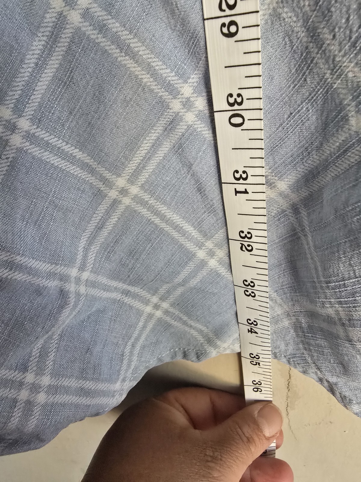 This light blue dress from Gap features a white checkered pattern and an A-line