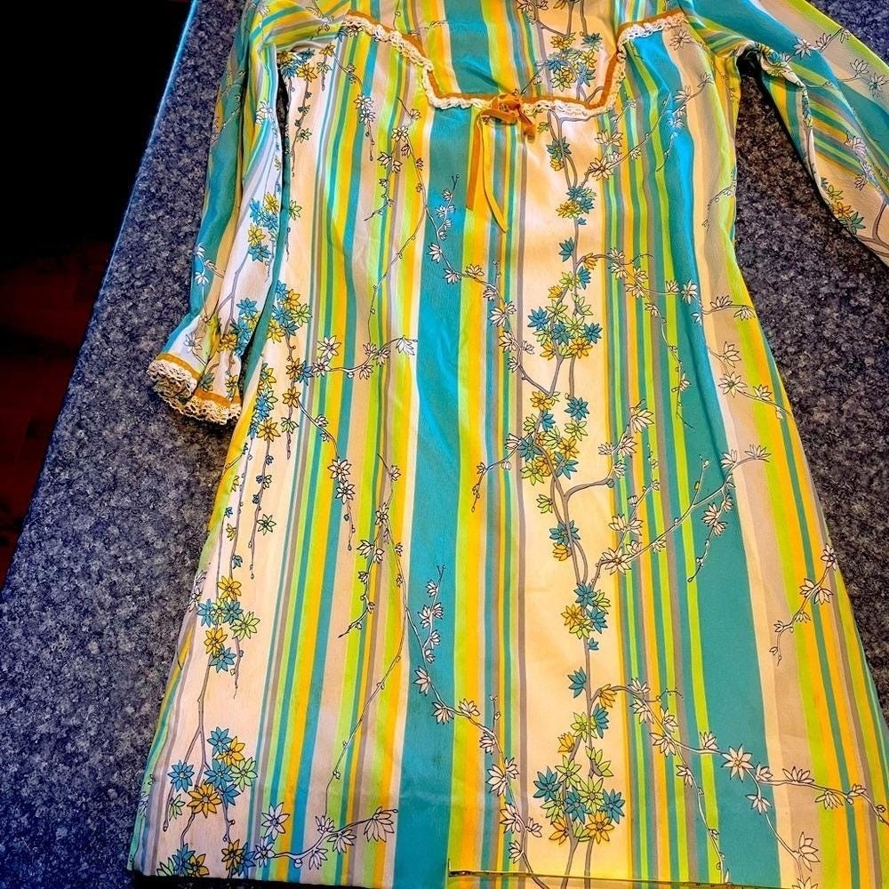 Retro handmade dress. White with blue, green and yellow flowers and stripes.