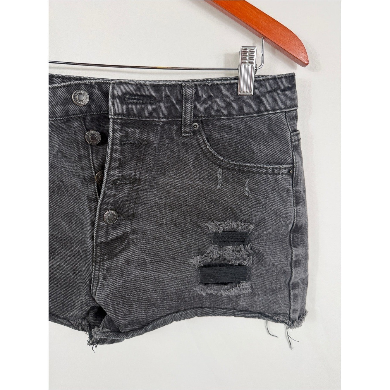 Forever 21 Black Distressed High-Rise Denim Shorts. Paint mark on back. Size 29