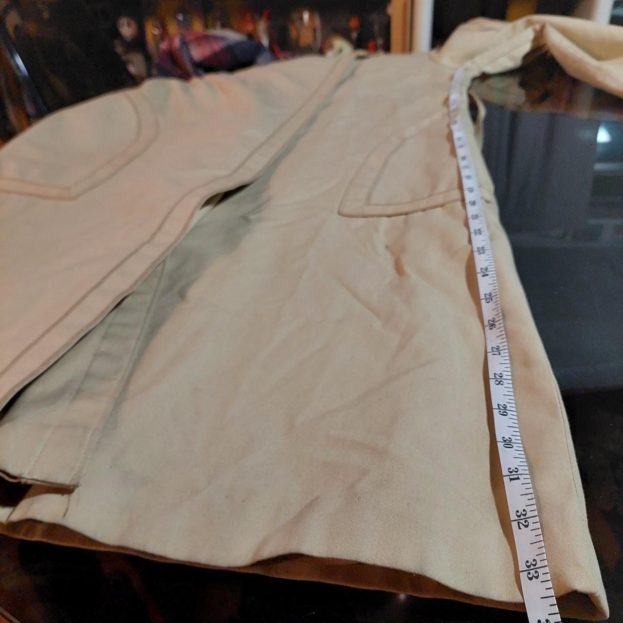 Vintage tan 1970s trench coat.