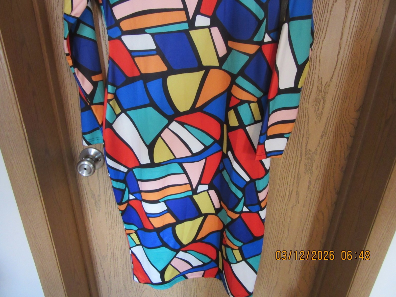 Vintage 60s 70s abstract dress with long sleeves and zippered front.