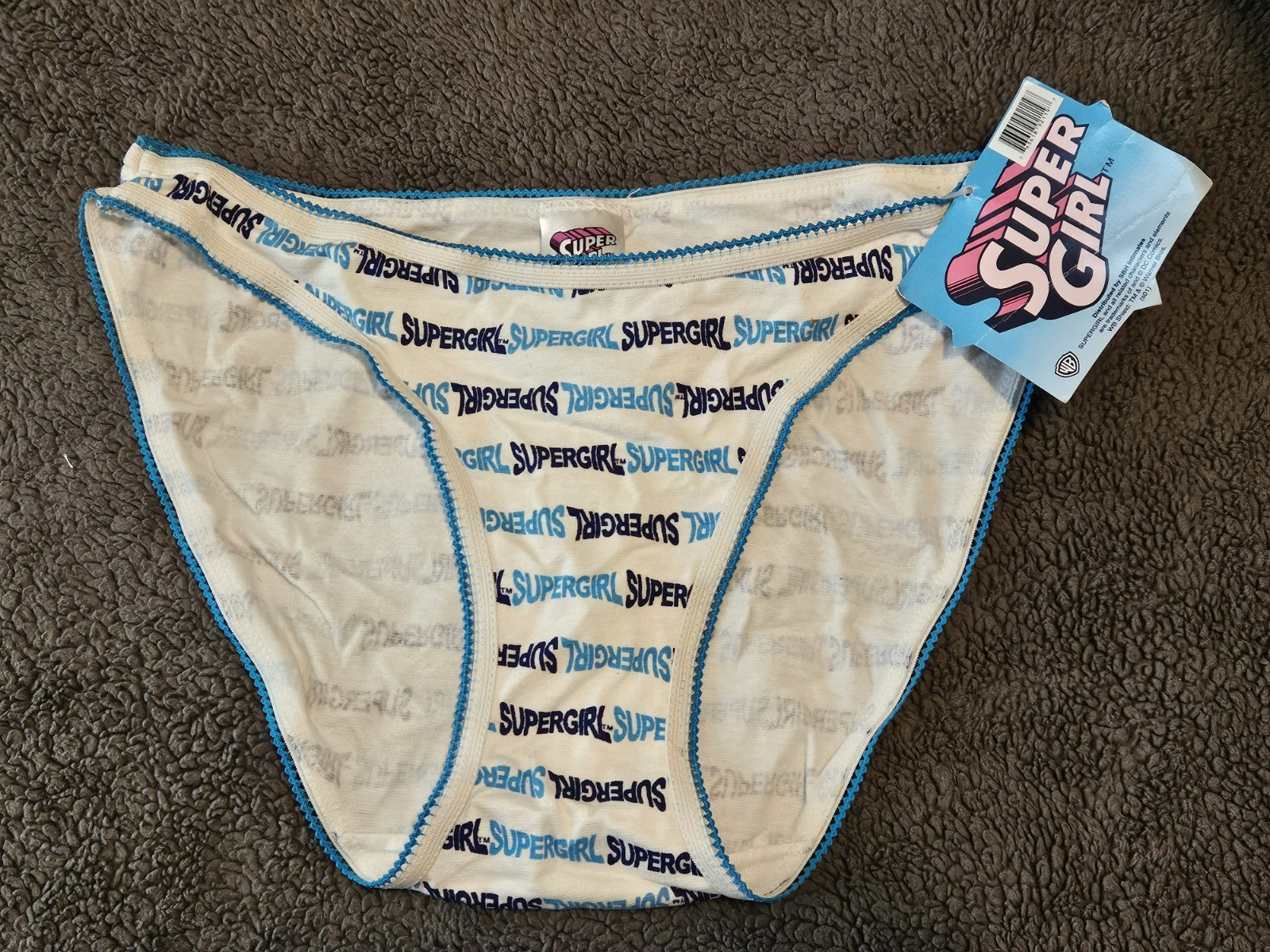 SuperGirl Intimates Women’s Bikini Panties Sz: SMALL Color: WHITE/BLUE WRITING