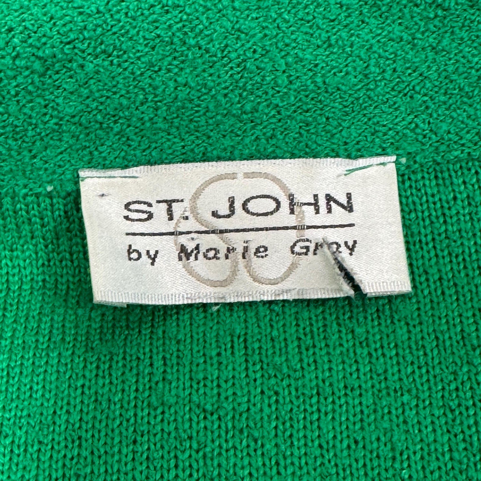 Vintage St John green Santana knit blazer with black and white knit trim