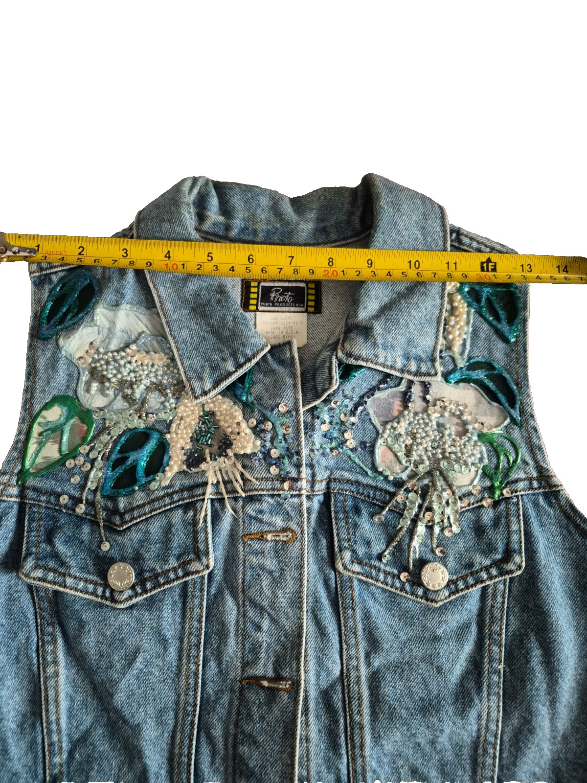 Embellished Denim Vintage 90s cropped fit vest with a light-to-medium wash