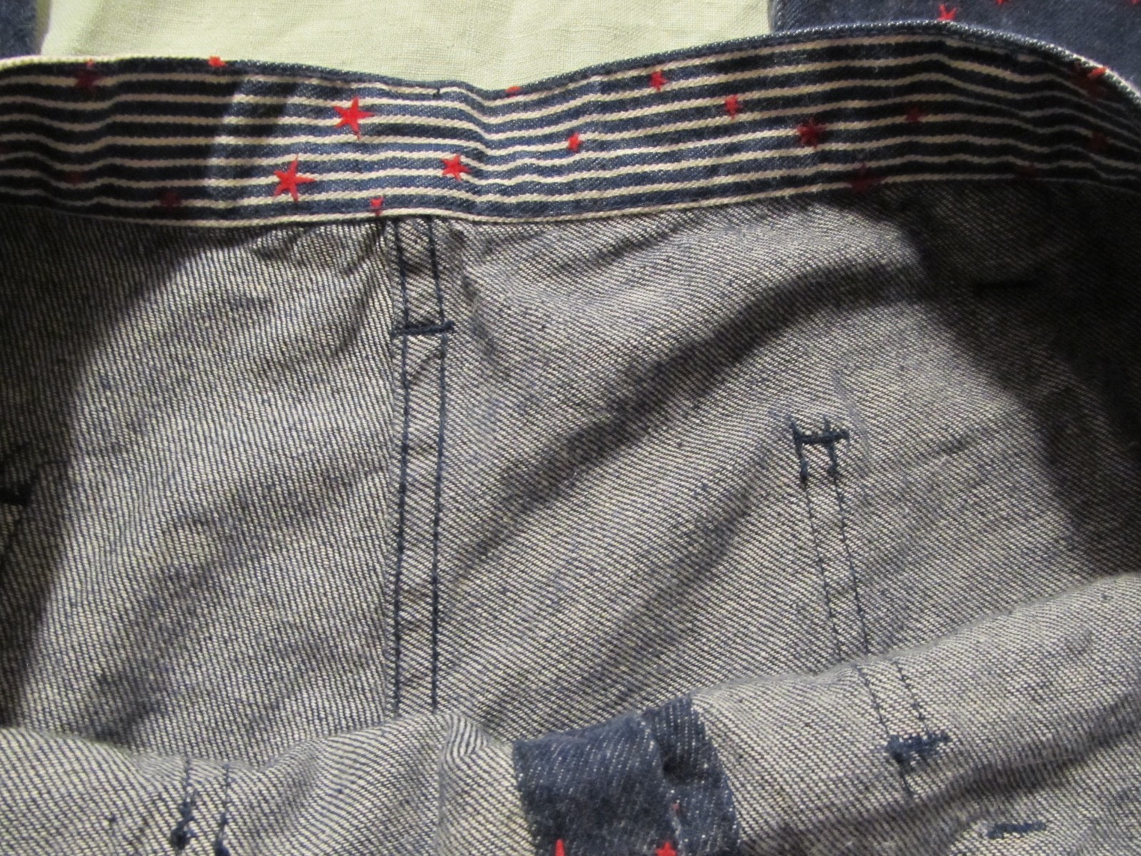 Vintage 1960’s denim with red stars & sailor button fly hip-hugger jeans/ pants