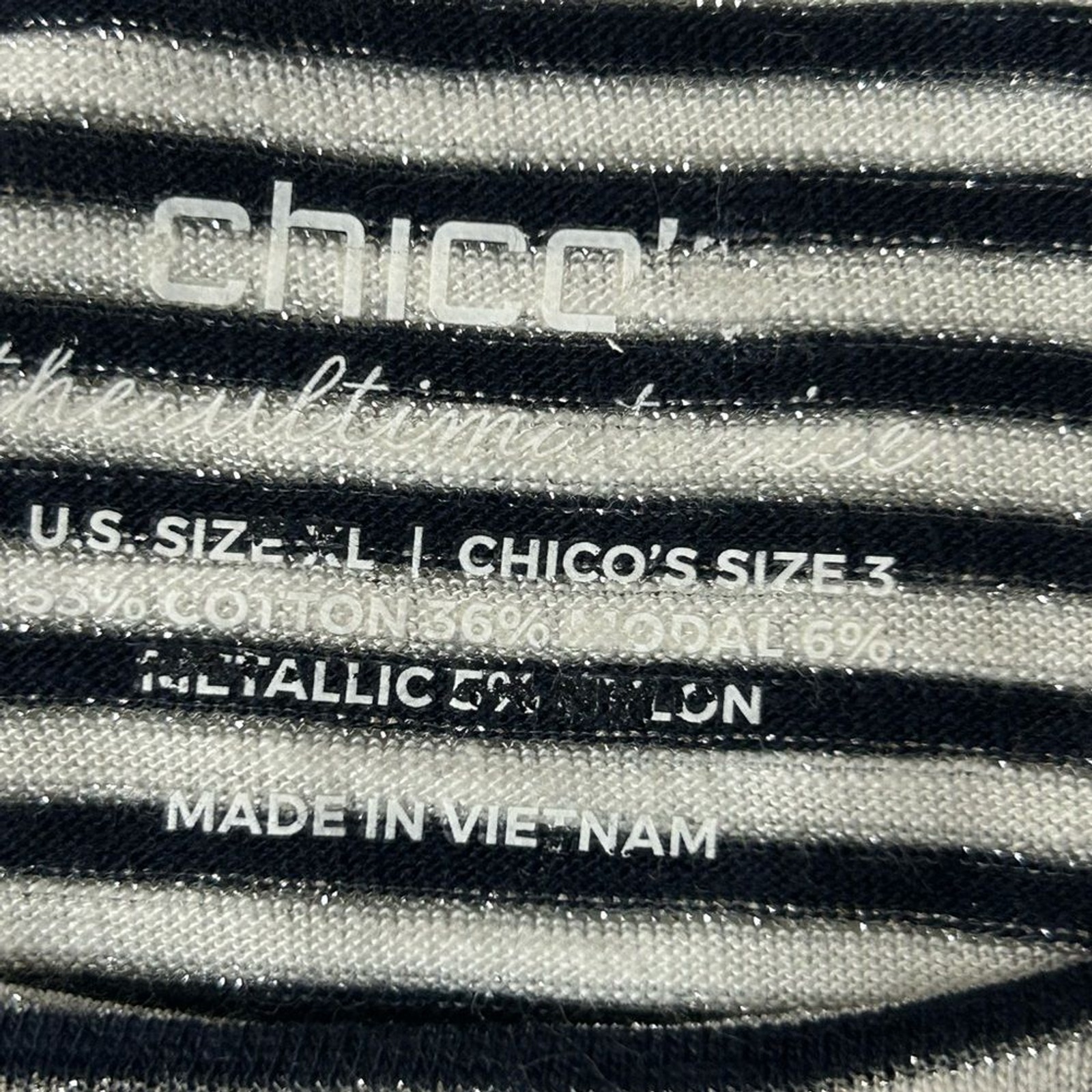 Chico’s women Black and White Striped Top with Metallic Accents.cotton modal .