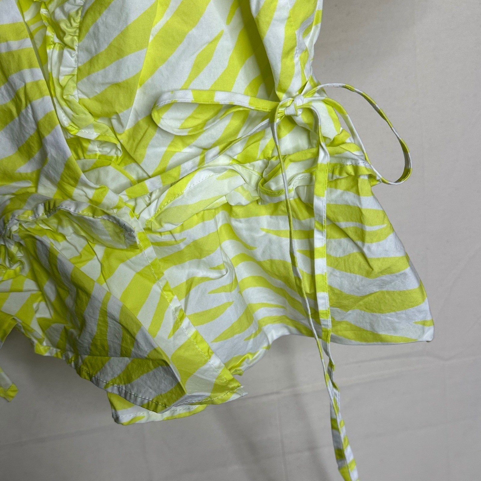 Skies Are Blue Zebra Print Peplum Overlap Top size Large Lime Yellow/White