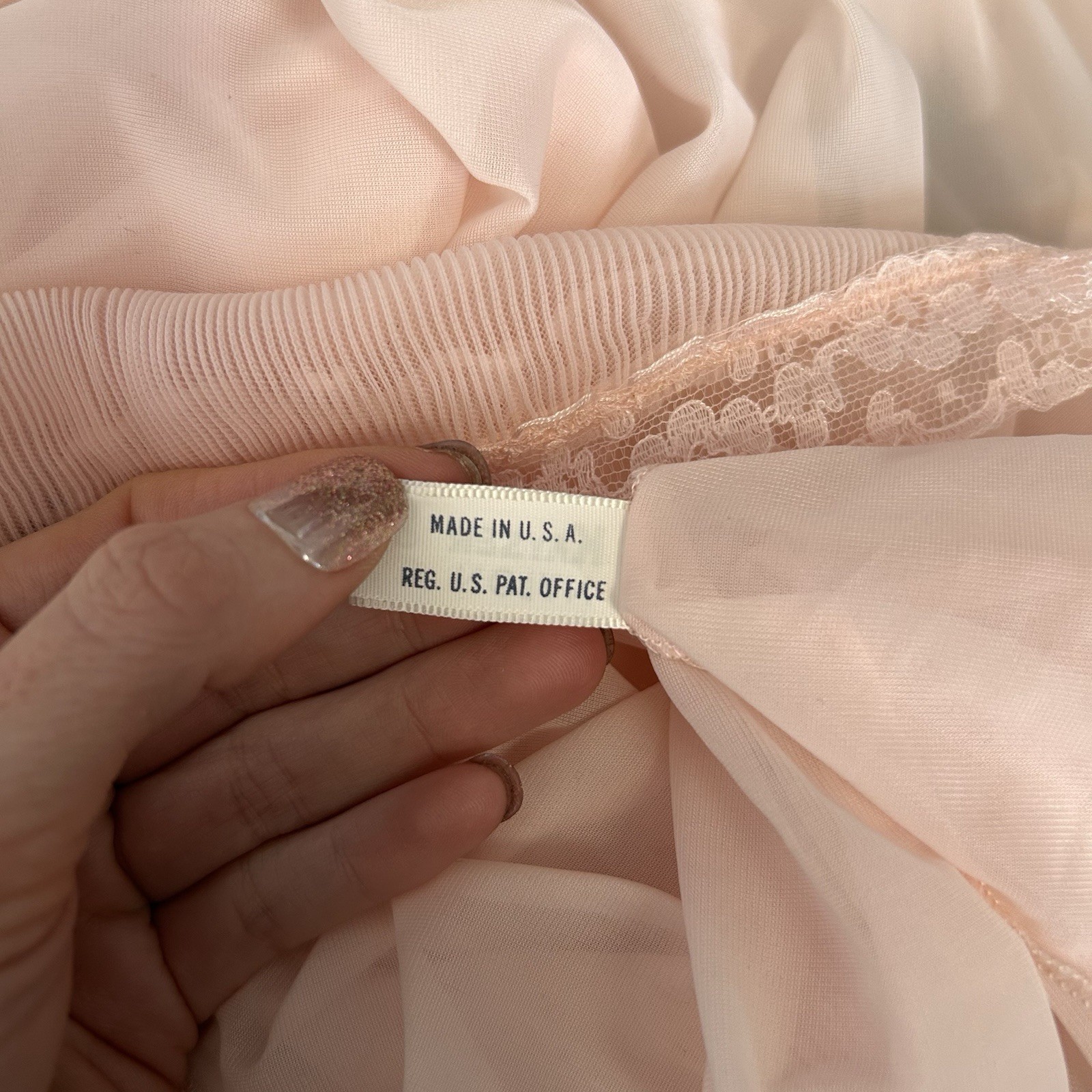Pink sheer vintage maxi dress with damaged lace trim and ruffle details.