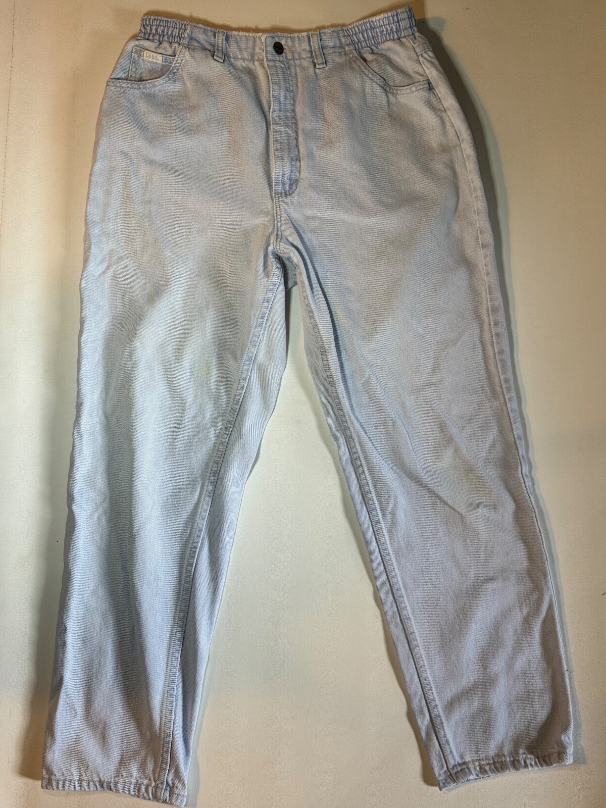 Vintage 1990’s Lee light wash denim jeans, elastic band on each side, 27″ Inseam