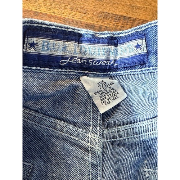 Vintage 1990s BUM equipment denim shorts with large logo patches. SZ 7 waist 28