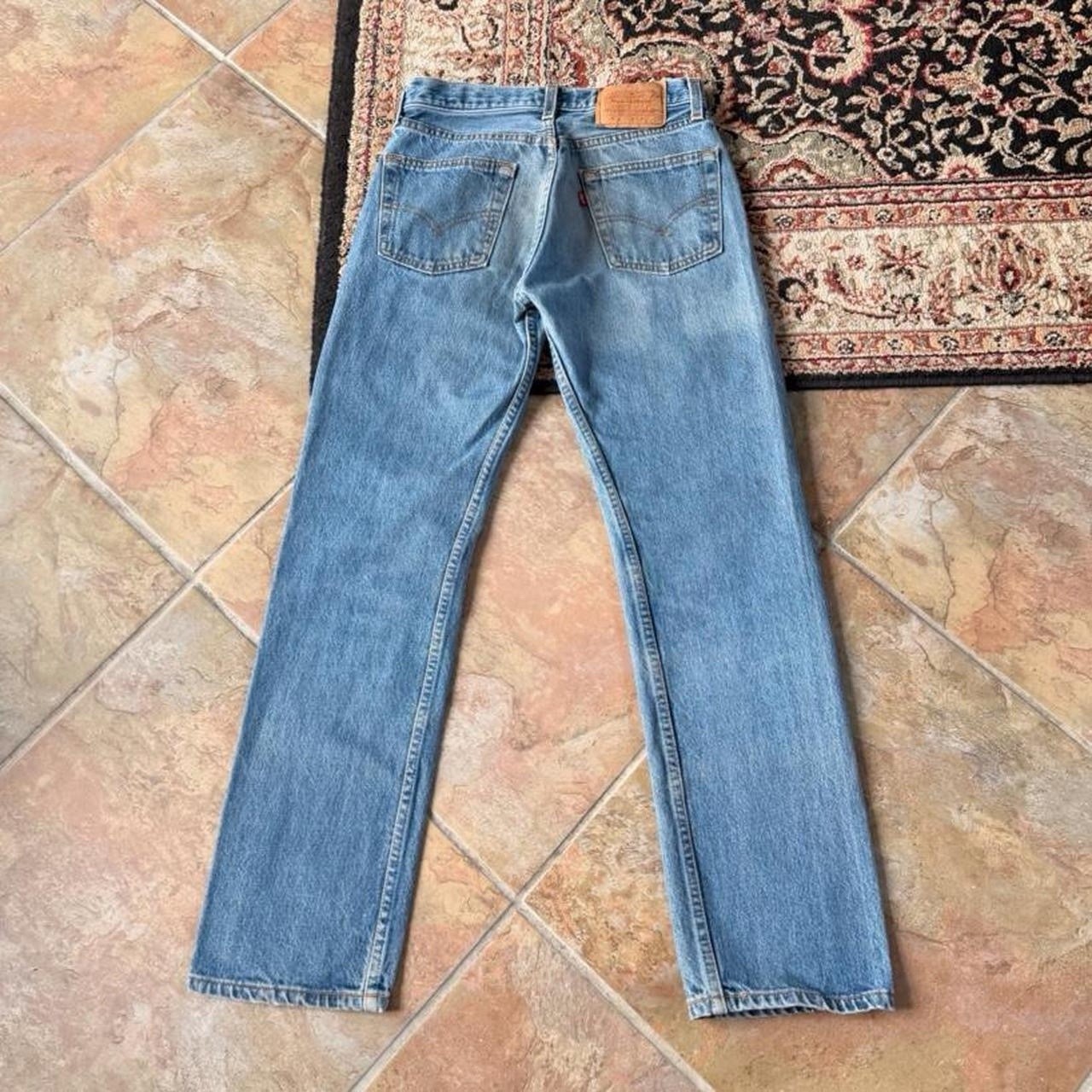 Vintage Levi’s 501 Jeans 27×30 Made In USA Button Fly Straight Leg Light Wash