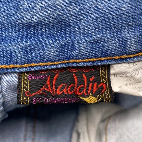 Vintage 90s Aladdin patched baggy jeans true vintage 28” waist Donnkenny