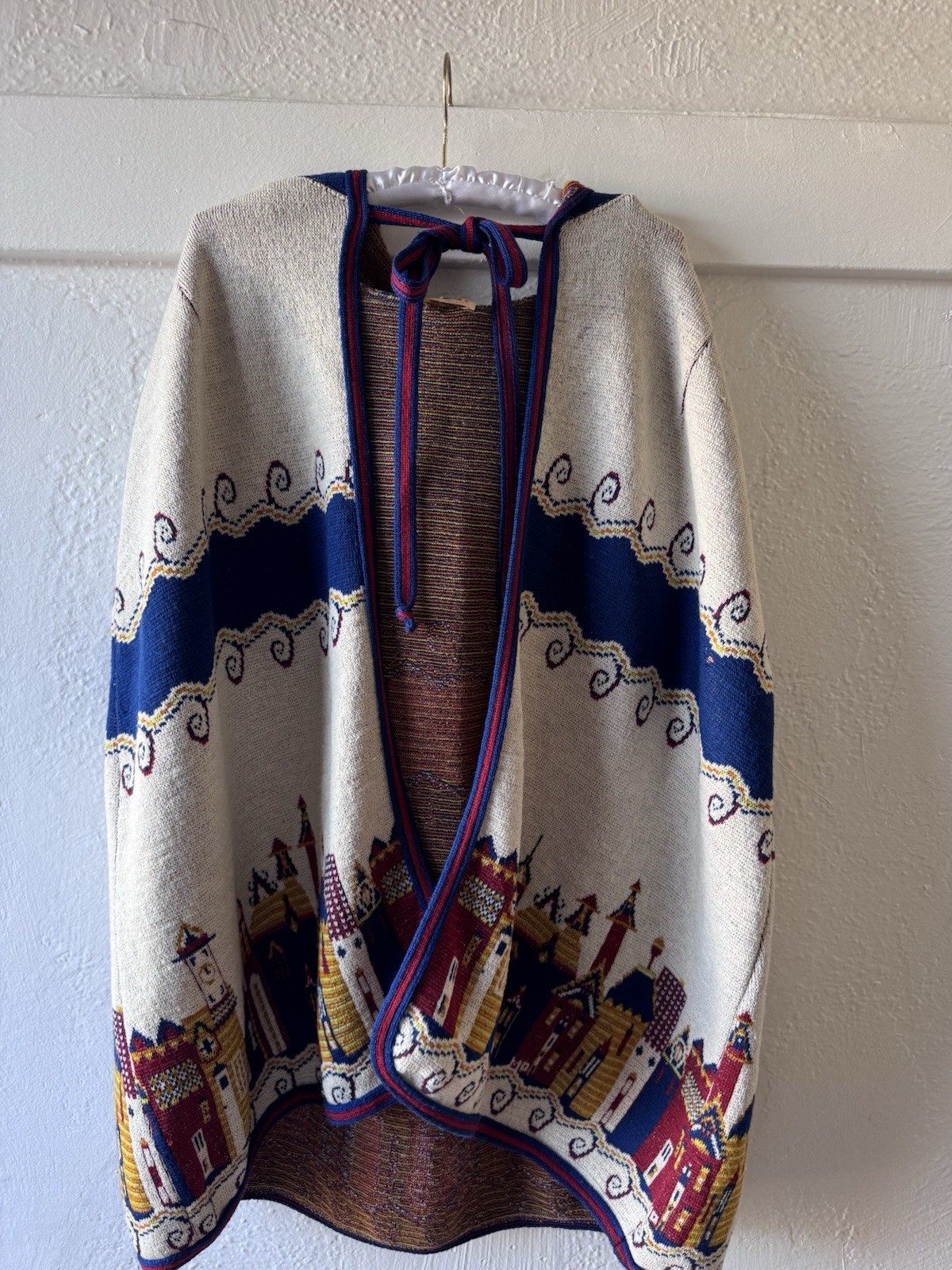 Vintage 1970’s Folkloric Hooded Cape In Novelty City Pattern By Sabra Knitwear