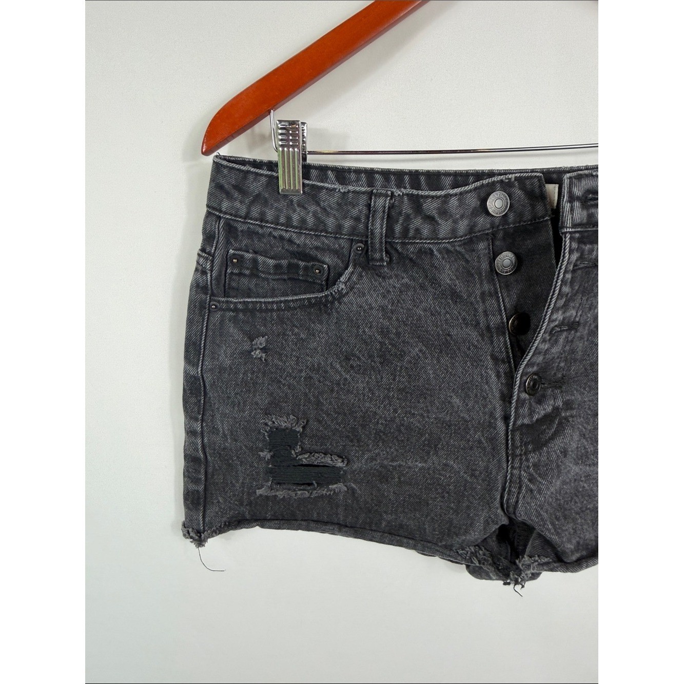 Forever 21 Black Distressed High-Rise Denim Shorts. Paint mark on back. Size 29