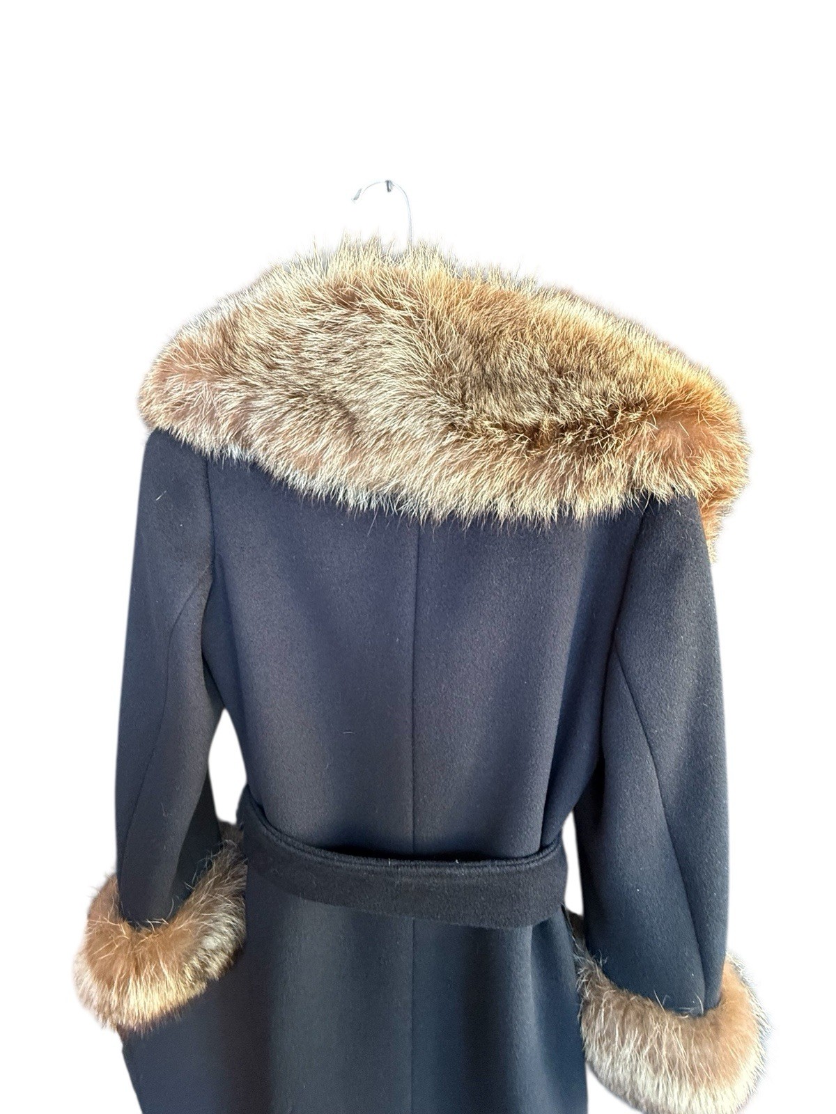 Absolutely Gorgeous Vintage black wool coat with Raccoon fur collar and wrists