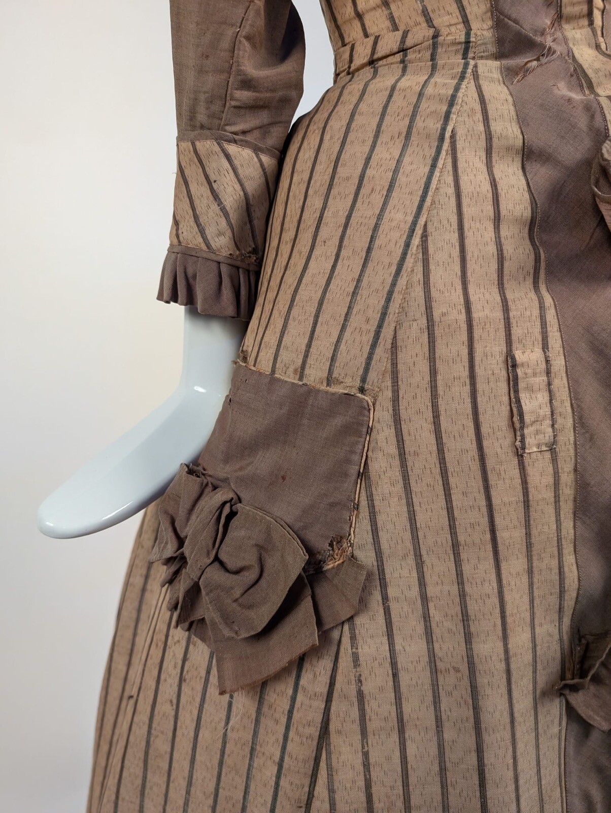 LATE 1860’S PINSTRIPED TAN BOMBAZINE DRESS W BOWS + SIDE POCKET DETAIL