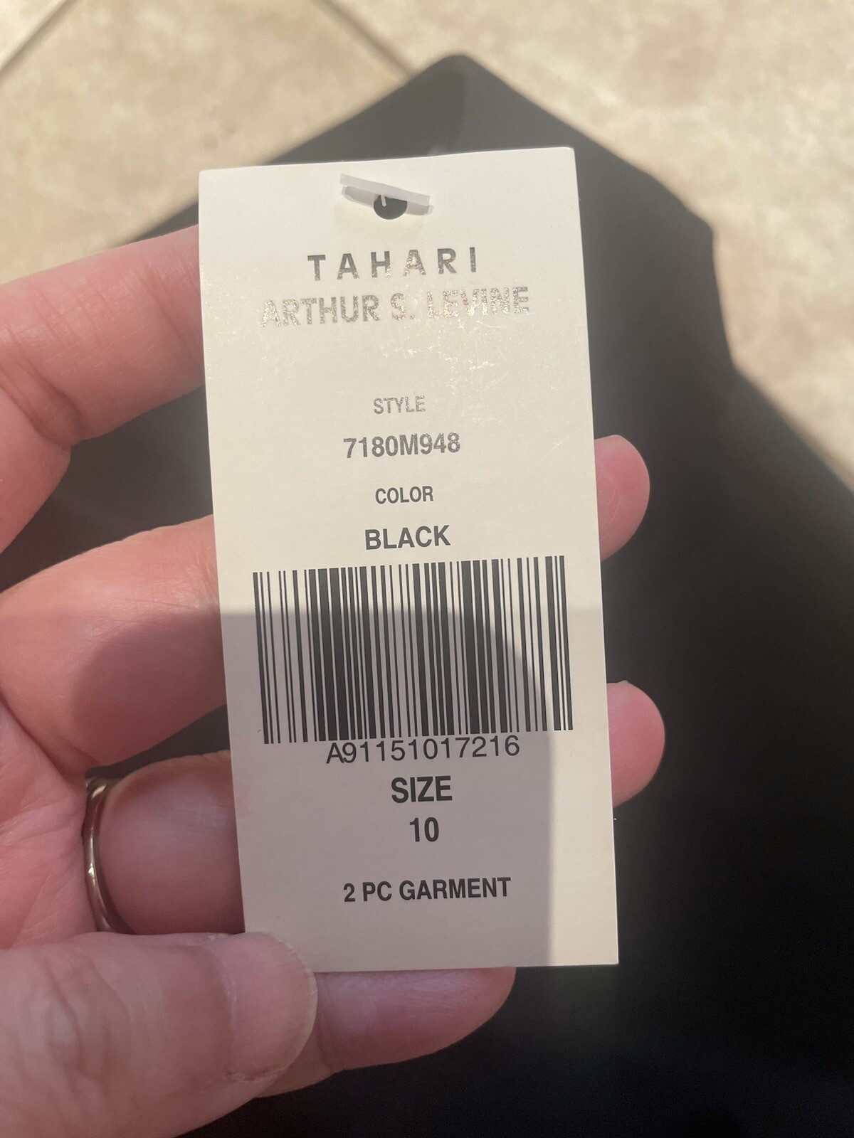 Tahari Arthur S. Levine 2 piece garment, blazer and pants. Size 10. Color black.
