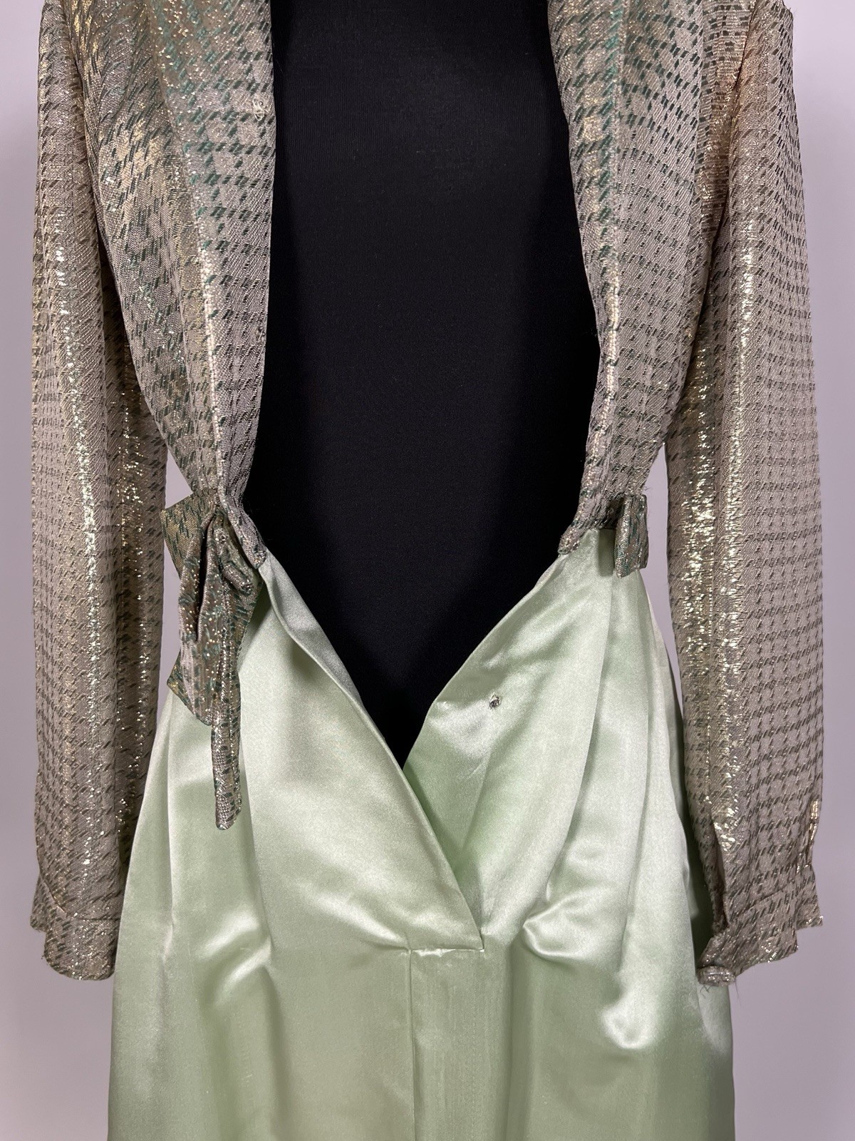 076 1960s Malcolm Starr long sleeve satin gown, pale green, metallic gold size S