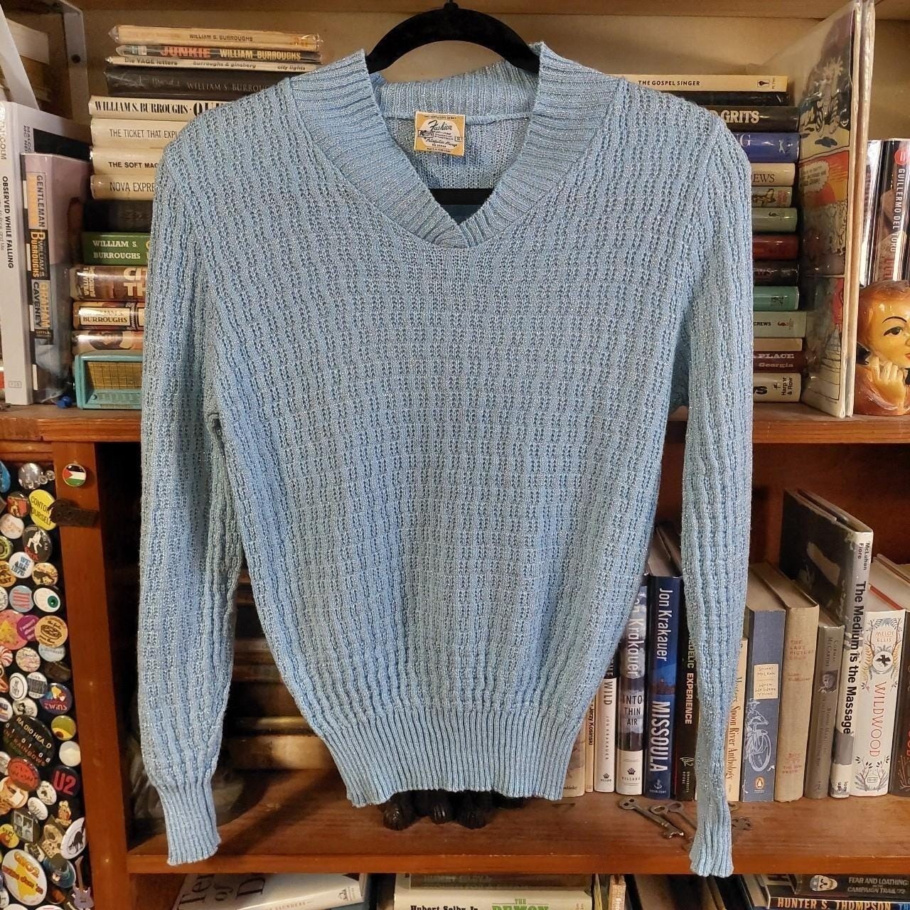 Vintage baby blue and silver metallic sweater.