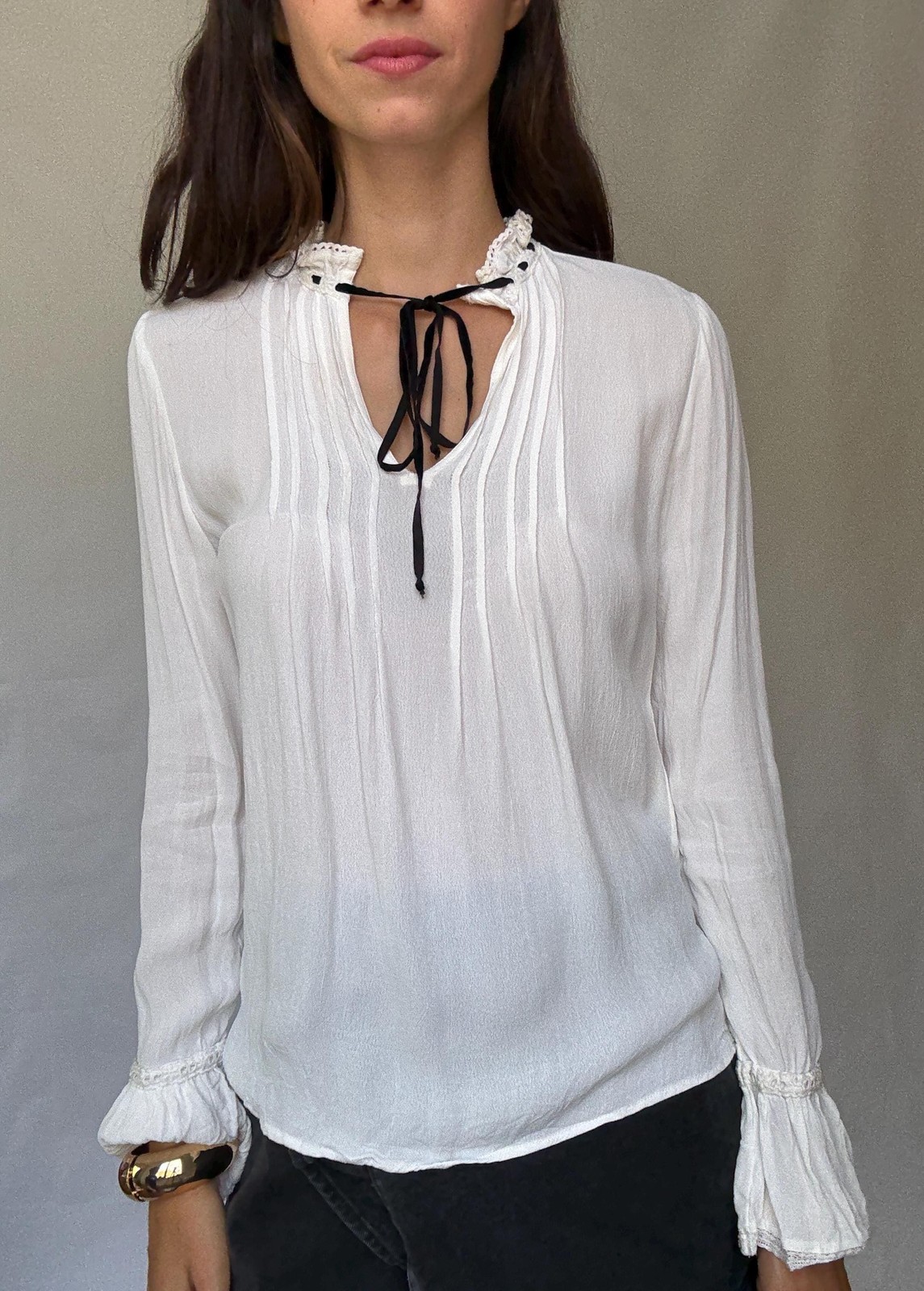 Romantic Bohemian White Blouse with Black Tie Detailing, Flowing Sleeves, and Ru