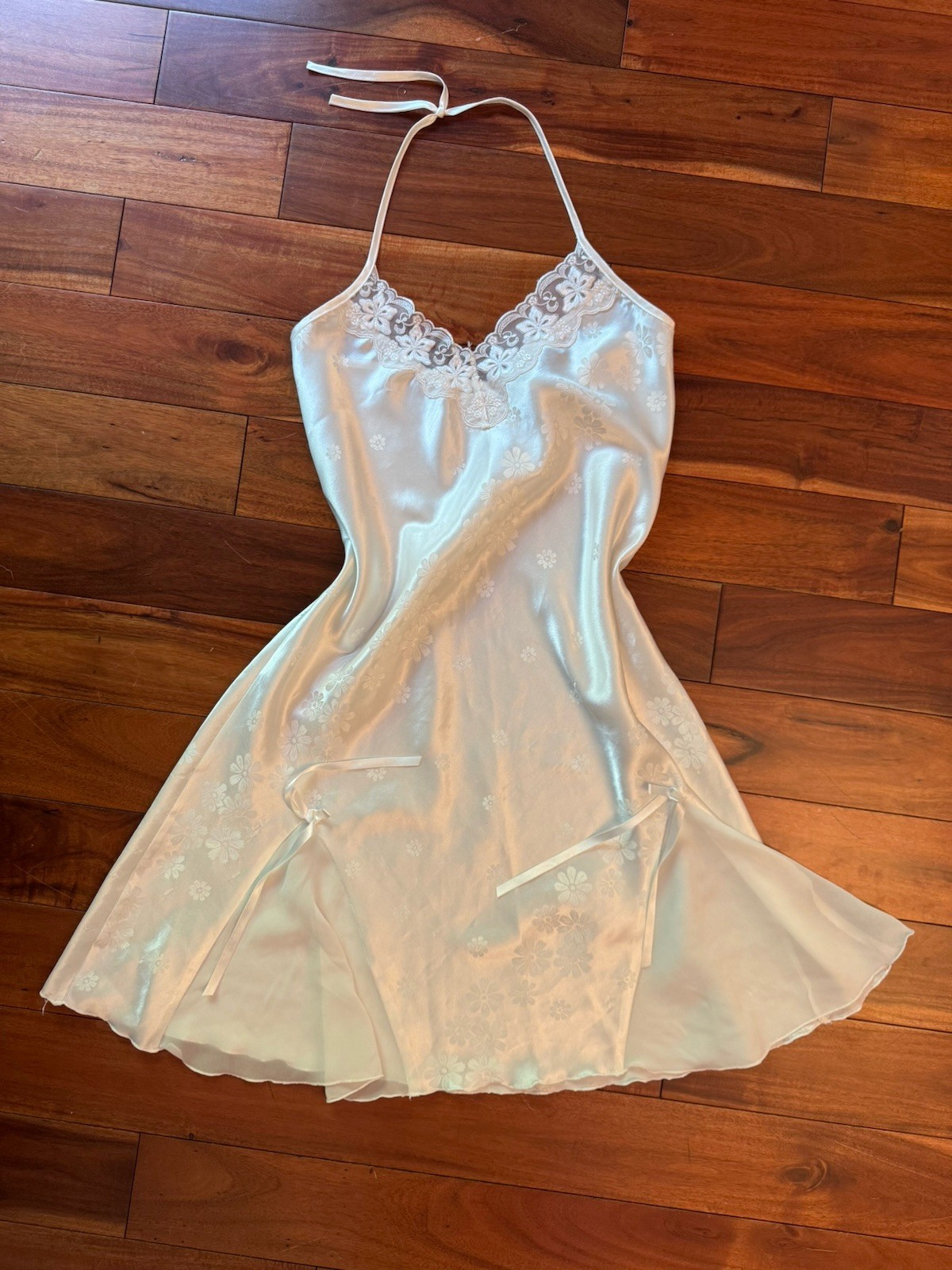 Lacy White Slip With Bow And Flower Details. Looks Like Size Large
