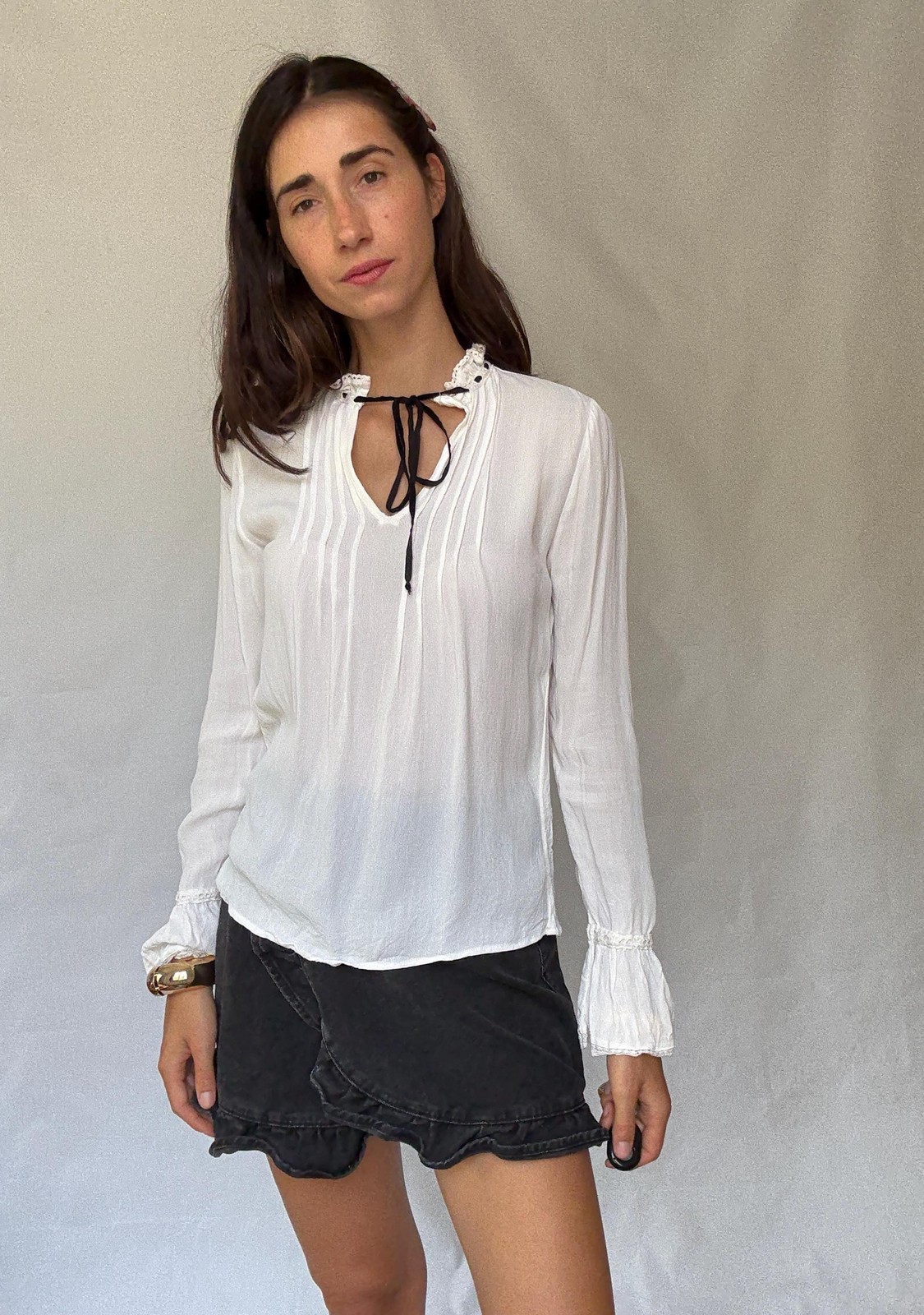 Romantic Bohemian White Blouse with Black Tie Detailing, Flowing Sleeves, and Ru
