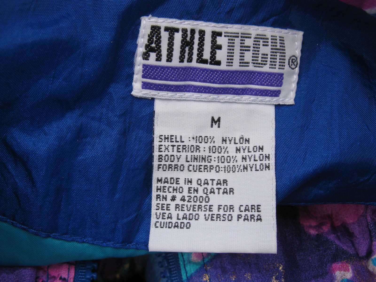 Vintage 1990’s era Athletech colorful nylon windbreaker women’s size medium