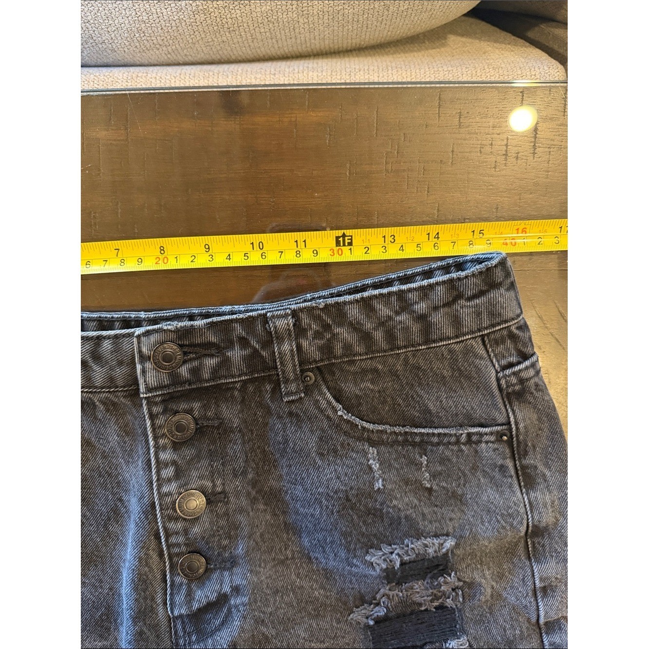 Forever 21 Black Distressed High-Rise Denim Shorts. Paint mark on back. Size 29