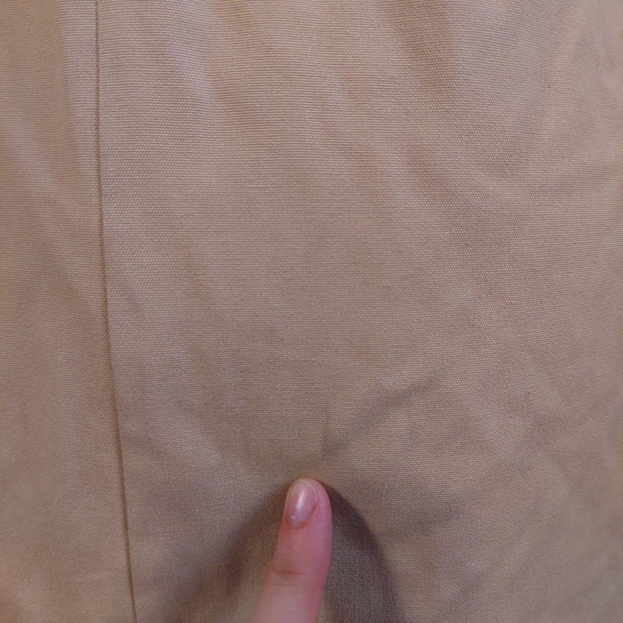 Vintage tan 1970s trench coat.