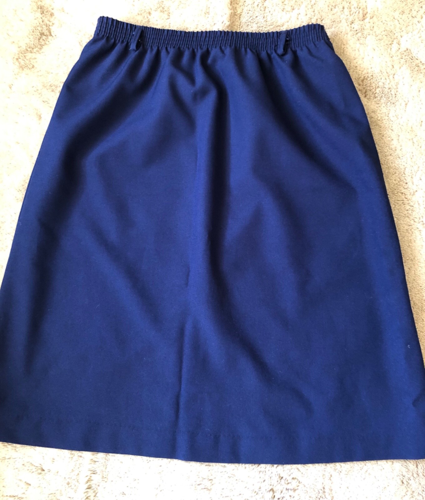 Women’s skirt size 14 blue 25” length waist 28-35” Elastic Stretch