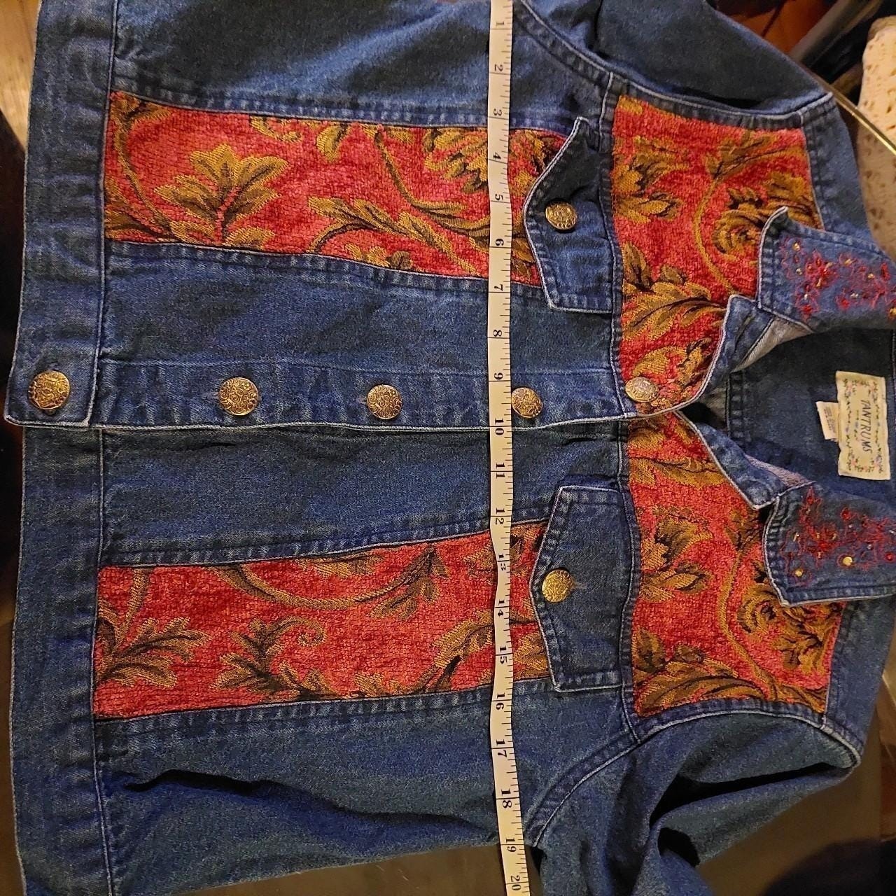 Vintage embellished jacket with gold buttons.