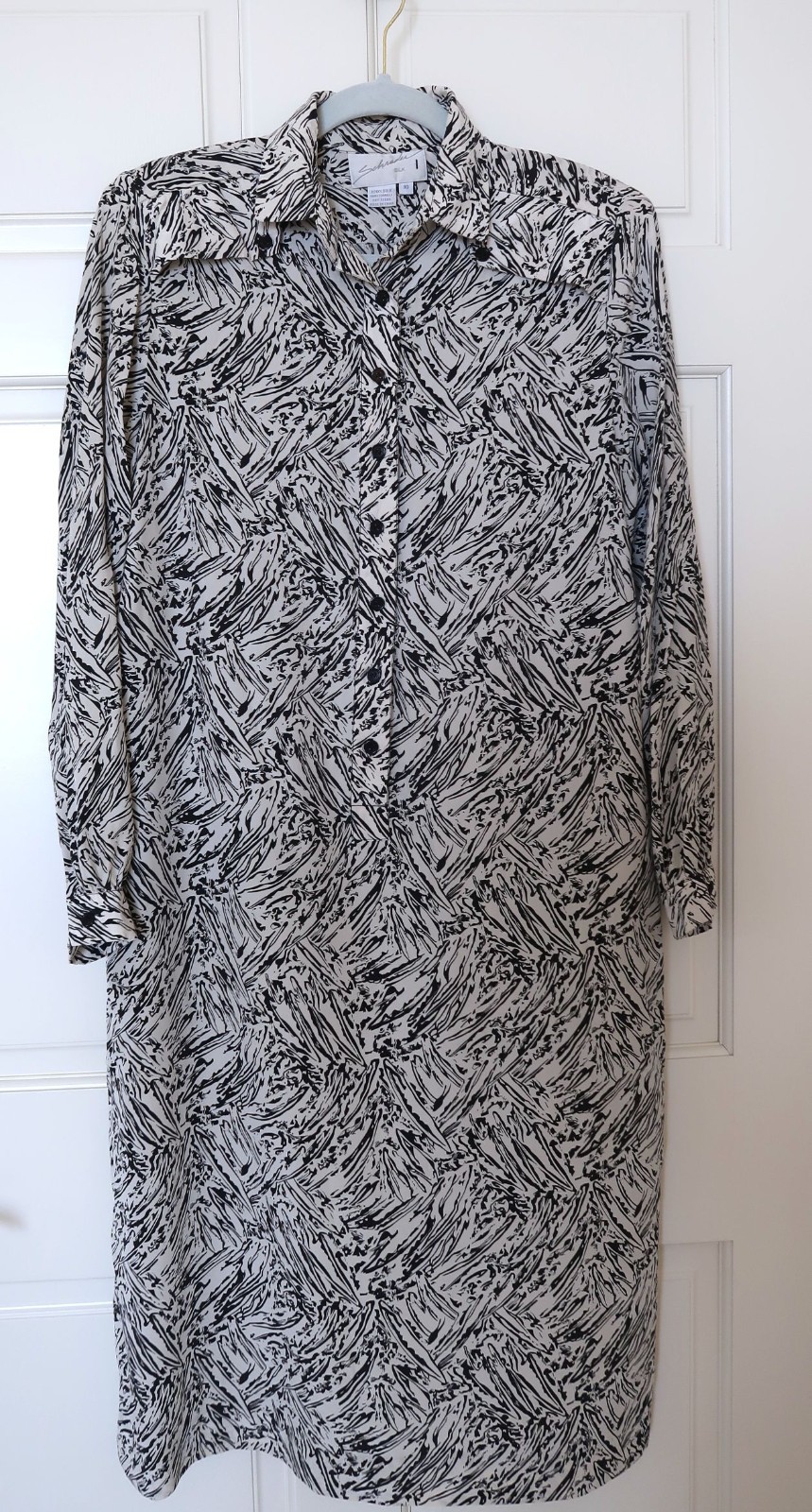 Schrader size 10, 100% silk classic long sleeve dress , black on ivory