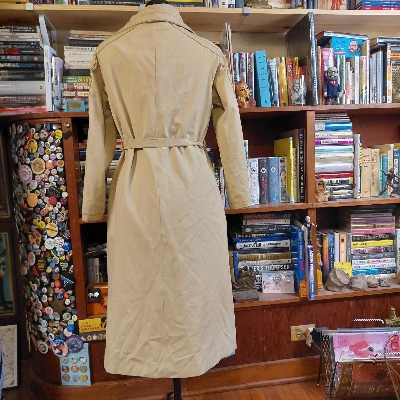 Vintage tan 1970s trench coat.