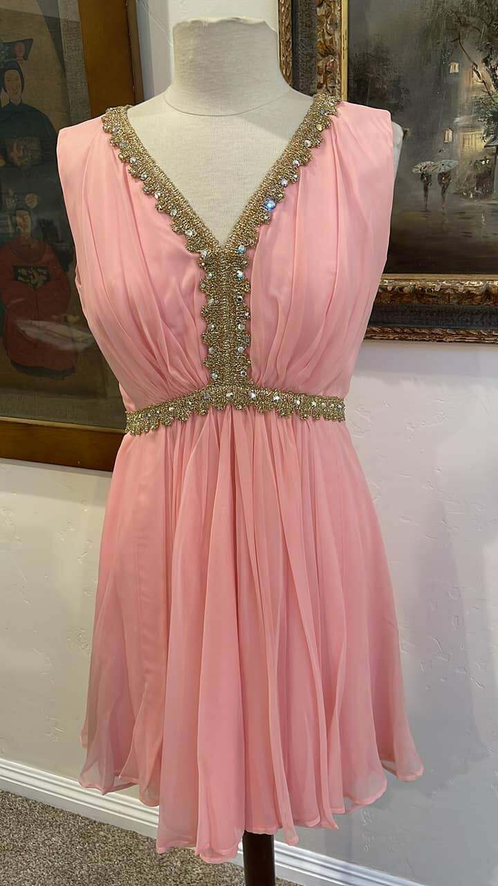Vintage Stunning Goddess dress with gold trim and prong set rhinestones 1960’s